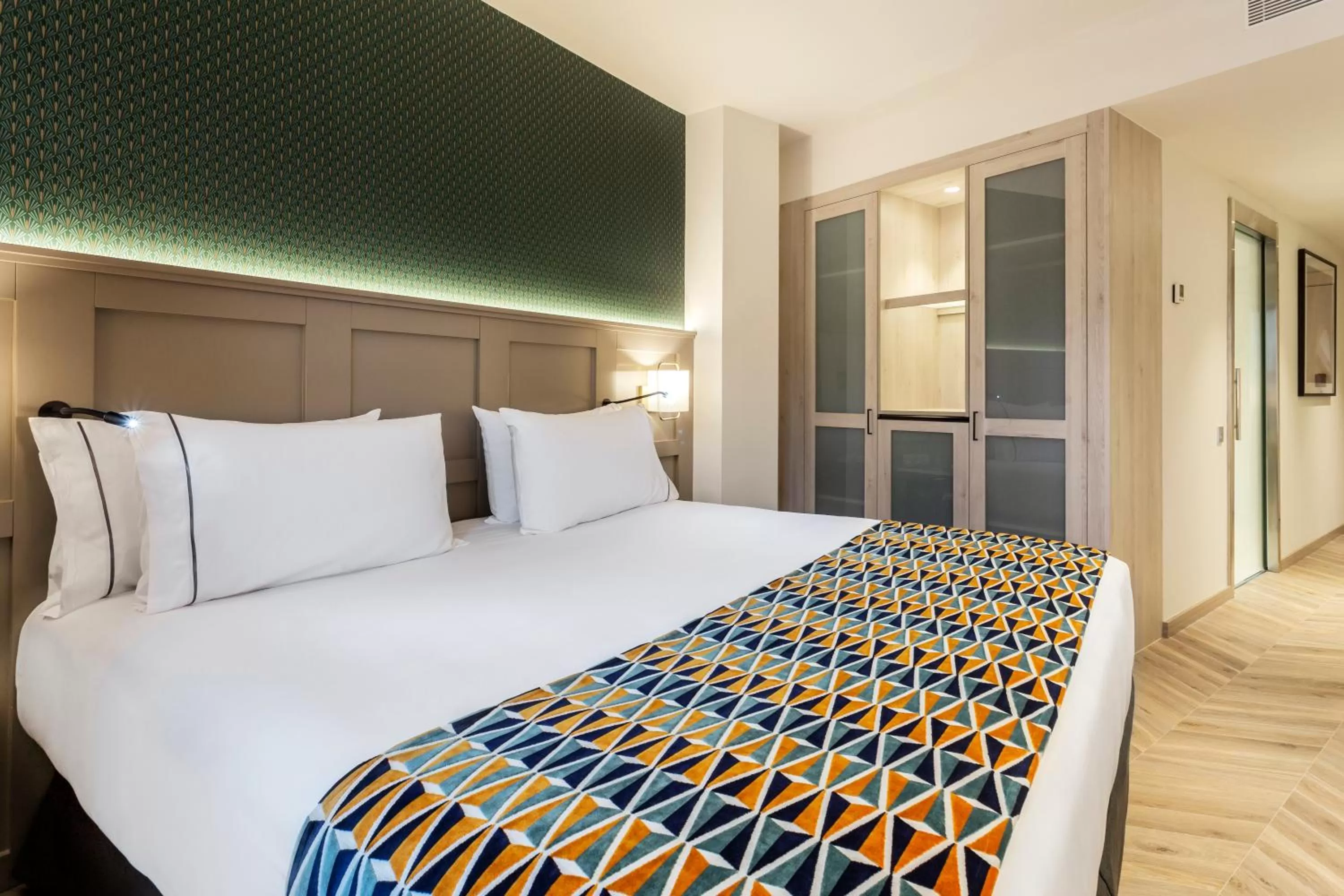 Photo of the whole room, Bed in Eurostars Puerta Real