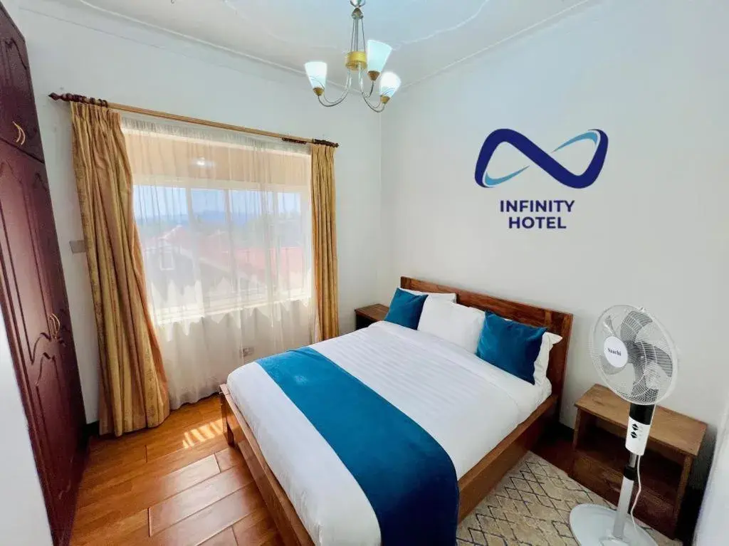 Bedroom, Bed in Infinity Hotel Kampala