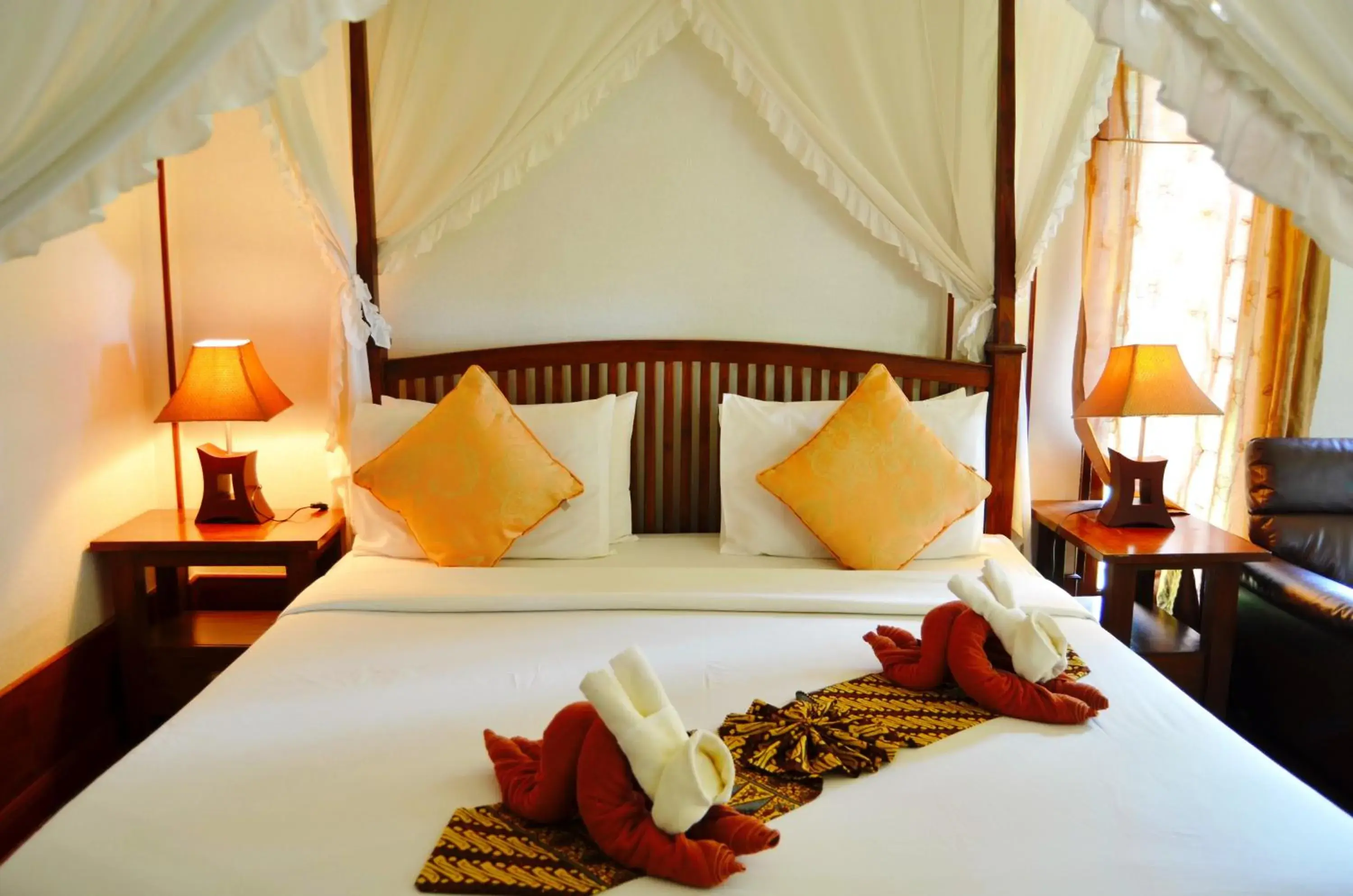 Bed in Sayang Beach Resort Koh Lanta