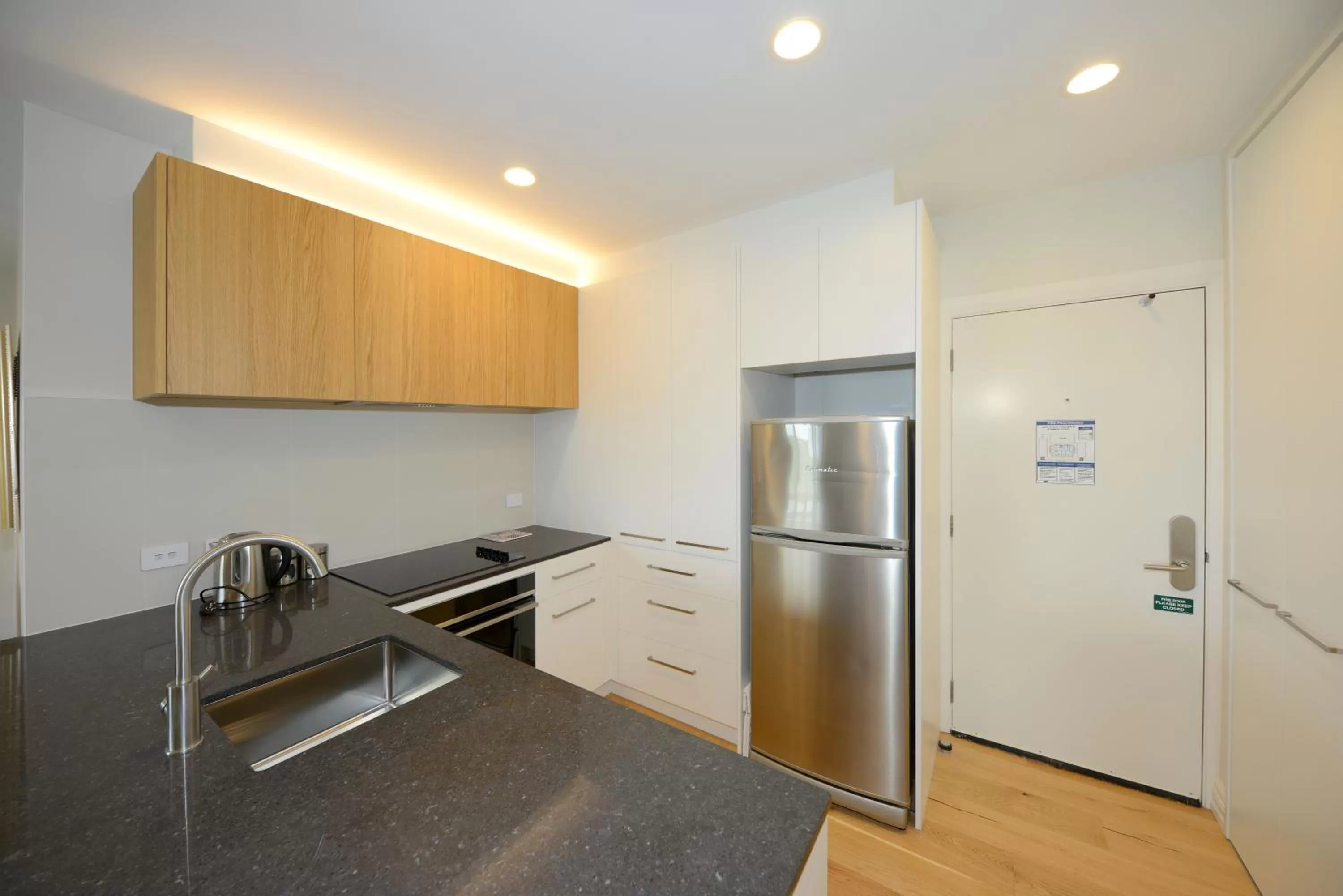 Kitchen or kitchenette in West Fitzroy Apartments