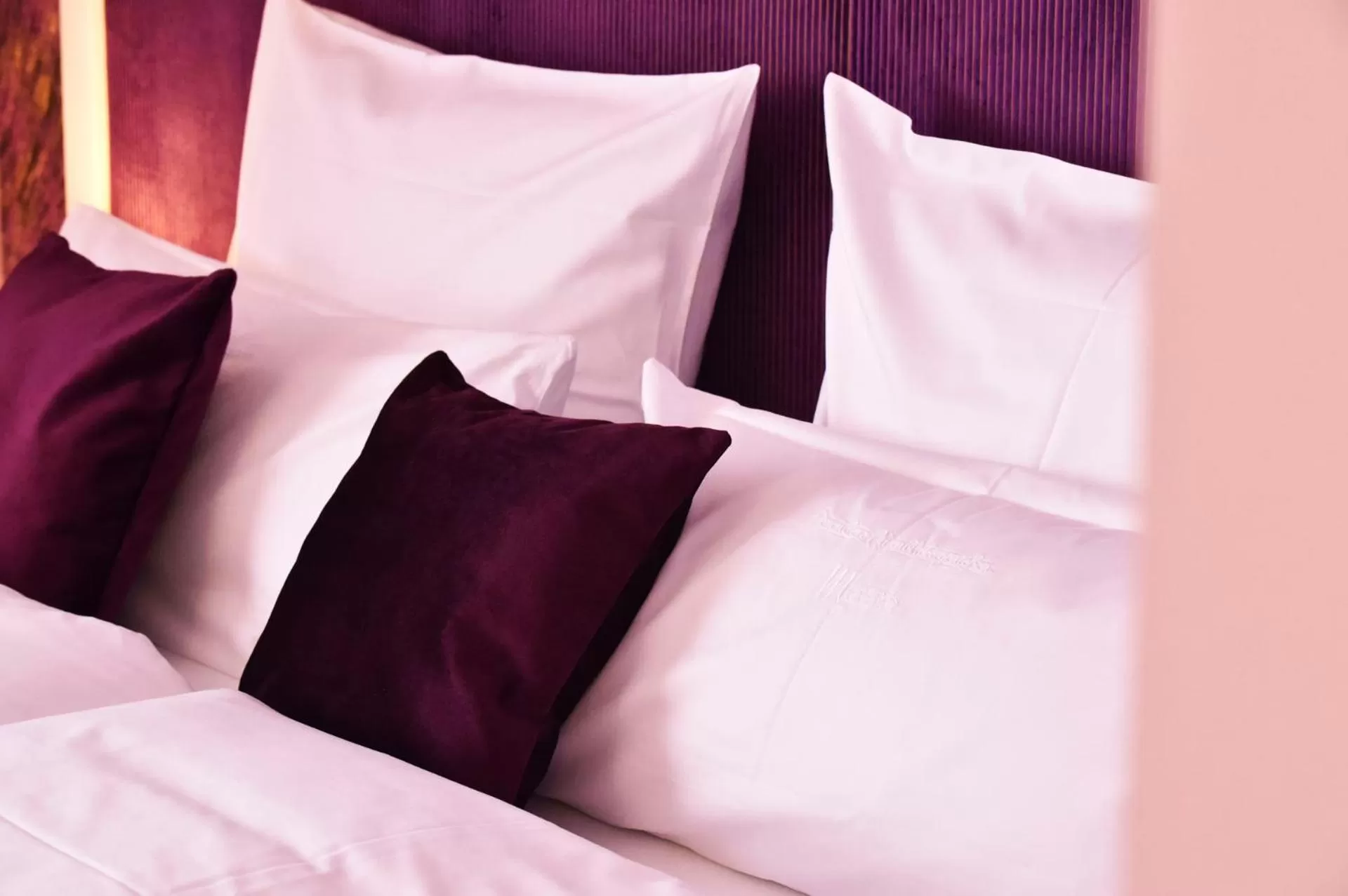 Decorative detail, Bed in MOMENTS Boutique Hotel