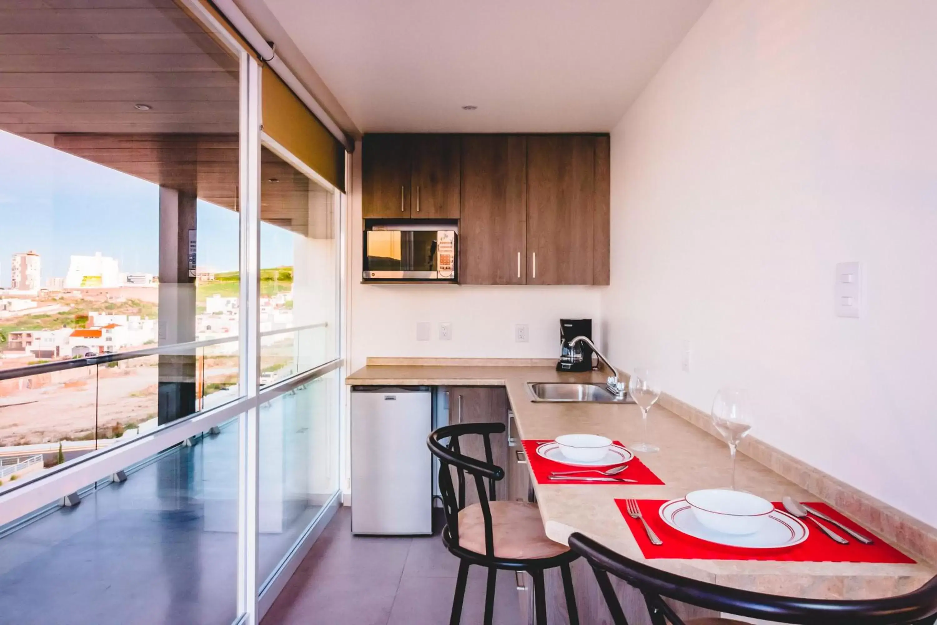 Kitchen/Kitchenette in Millenium Plaza & Suites