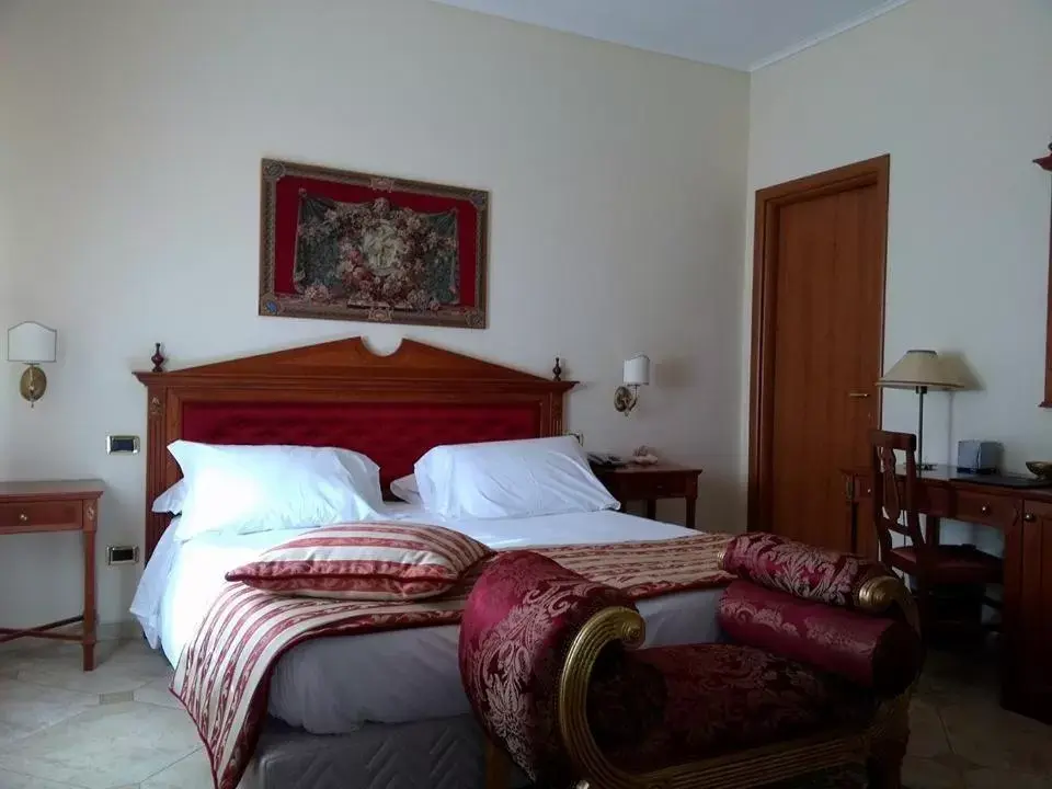 Bed in D'Angelo Palace Hotel