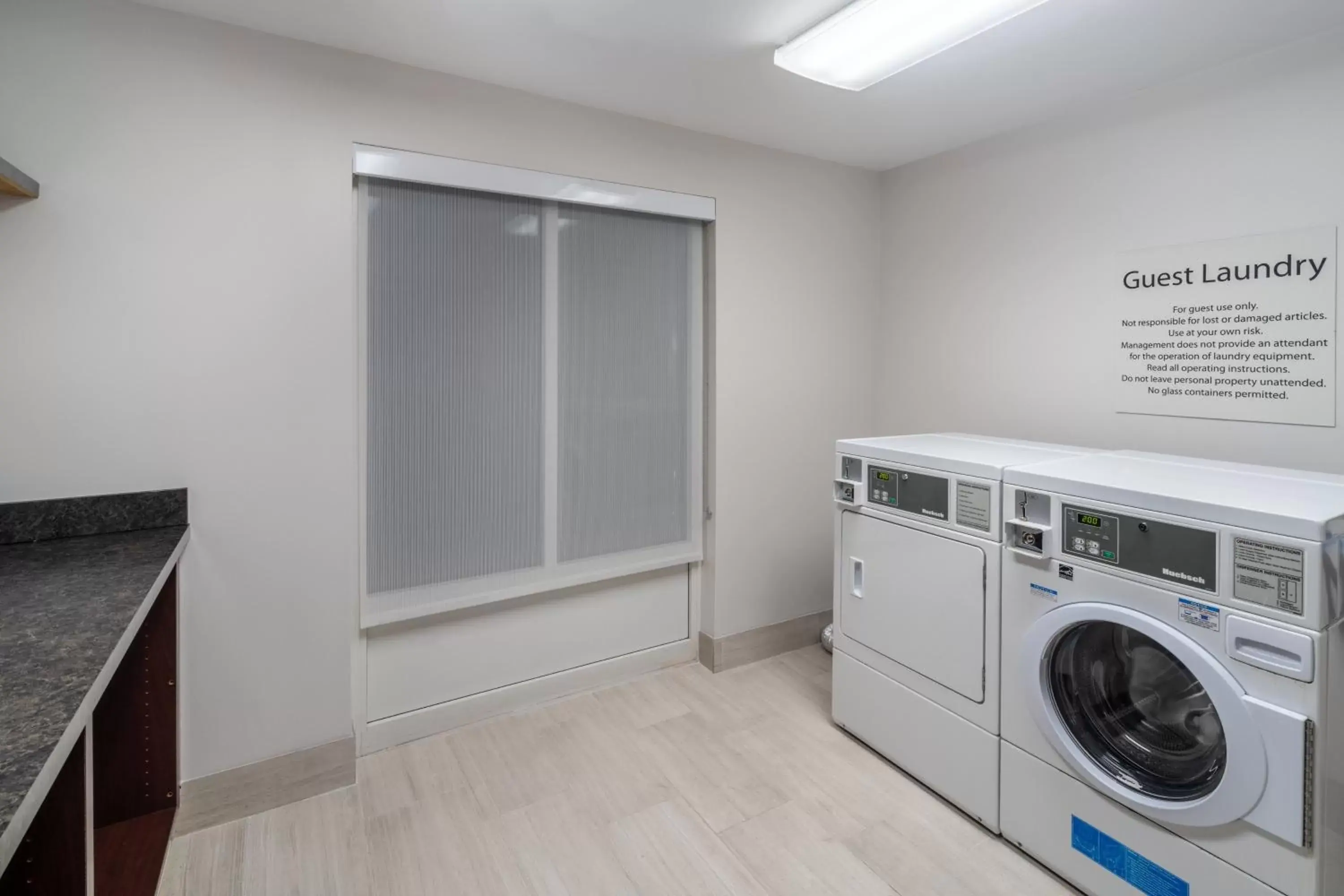 washing machine in Holiday Inn Express Hotel & Suites Talladega, an IHG Hotel