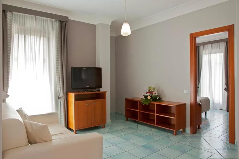 Communal lounge/ TV room in Hotel Villa Luisa