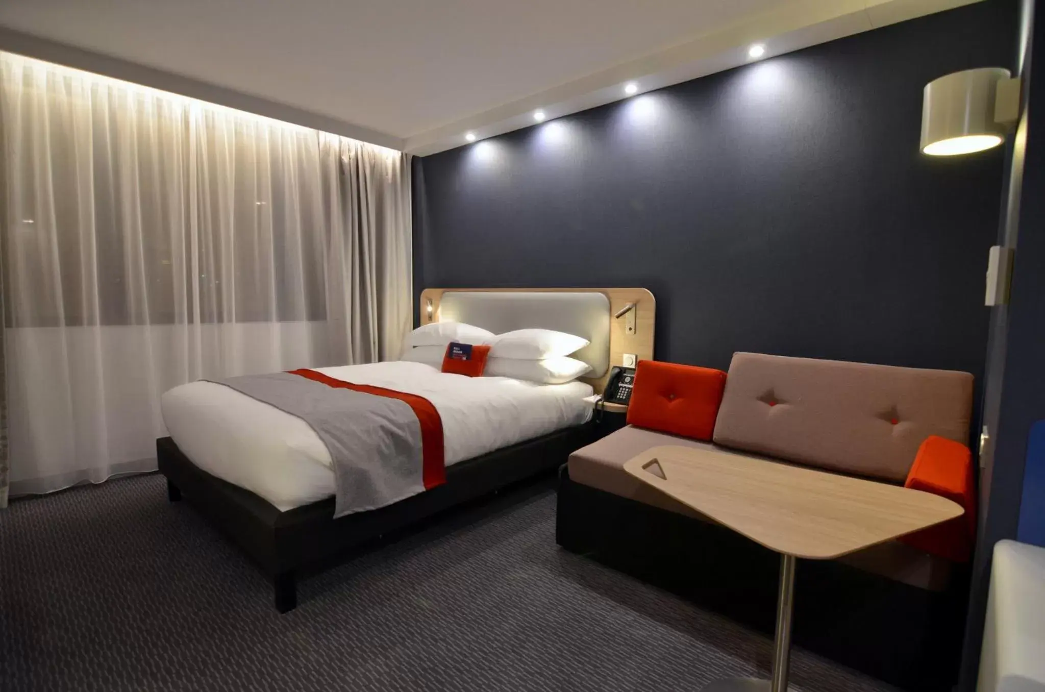 Photo of the whole room, Bed in Holiday Inn Express - Paris - CDG Airport, an IHG Hotel