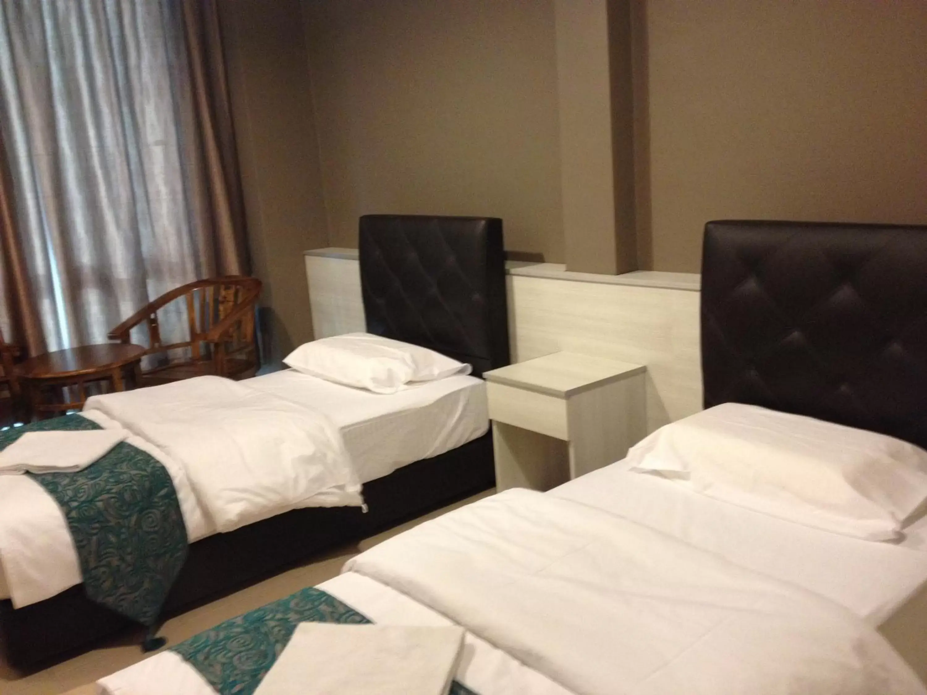 Bed in AERO Star Hotel