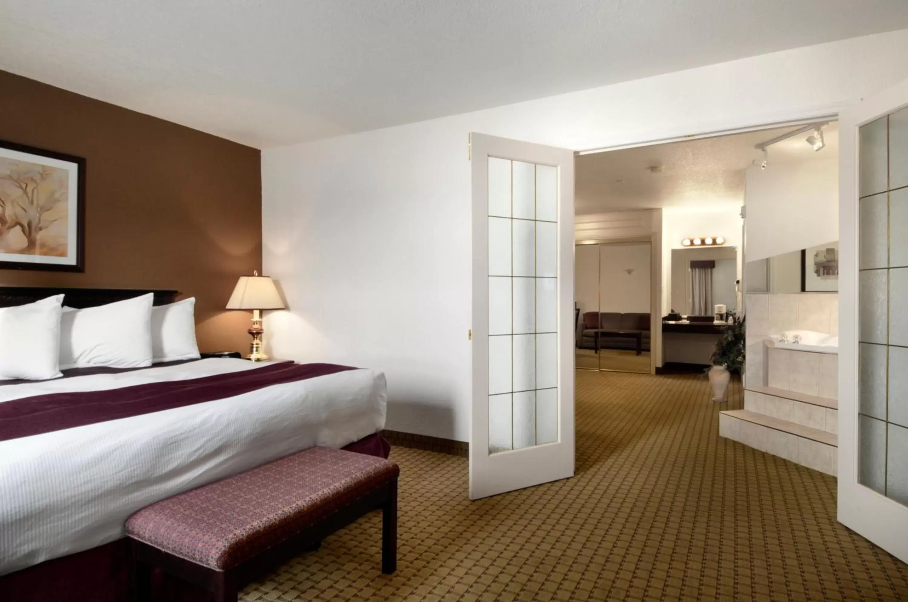 Bed in Ramada by Wyndham Red Deer Hotel & Suites