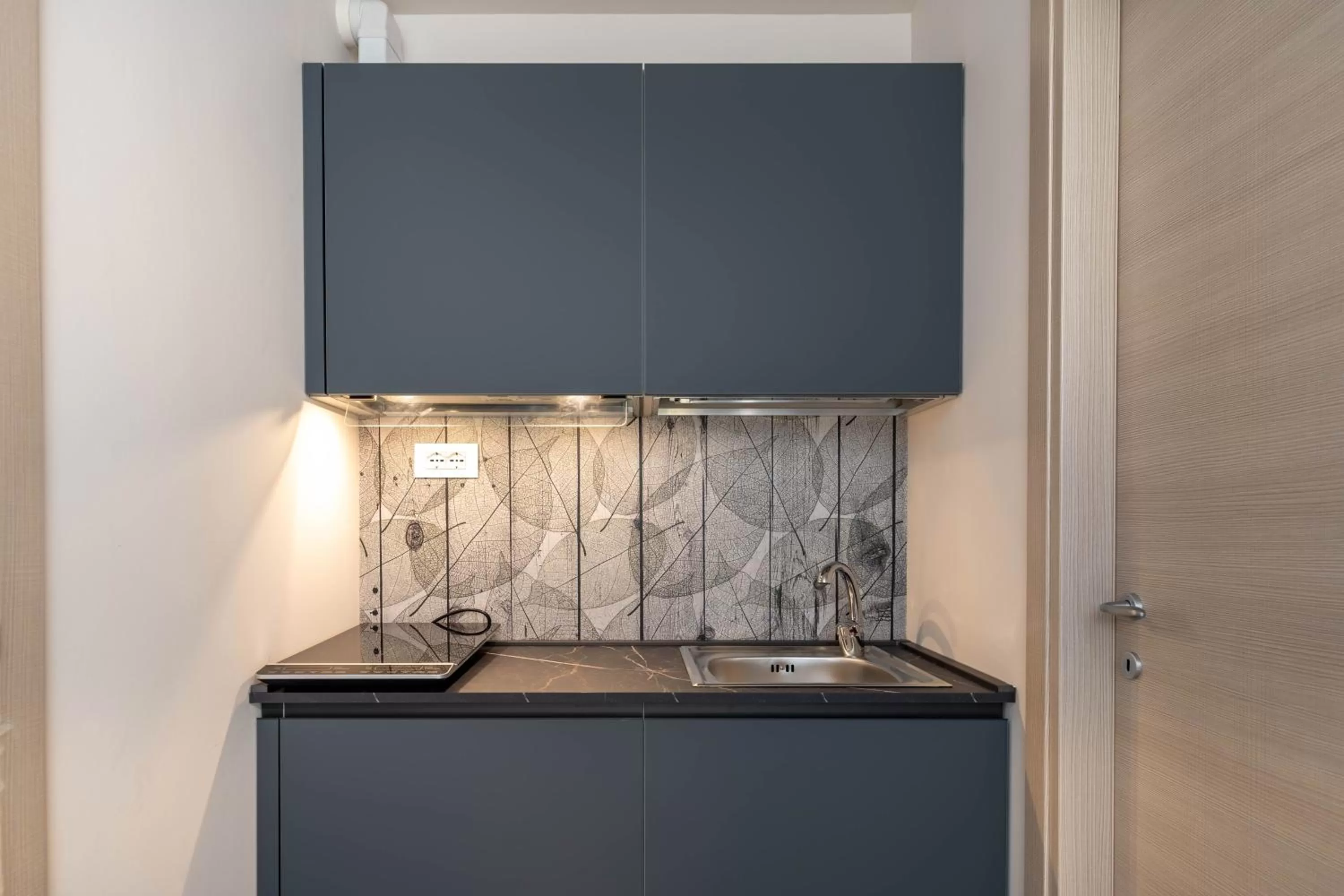 Kitchen or kitchenette in Dea Suite Room