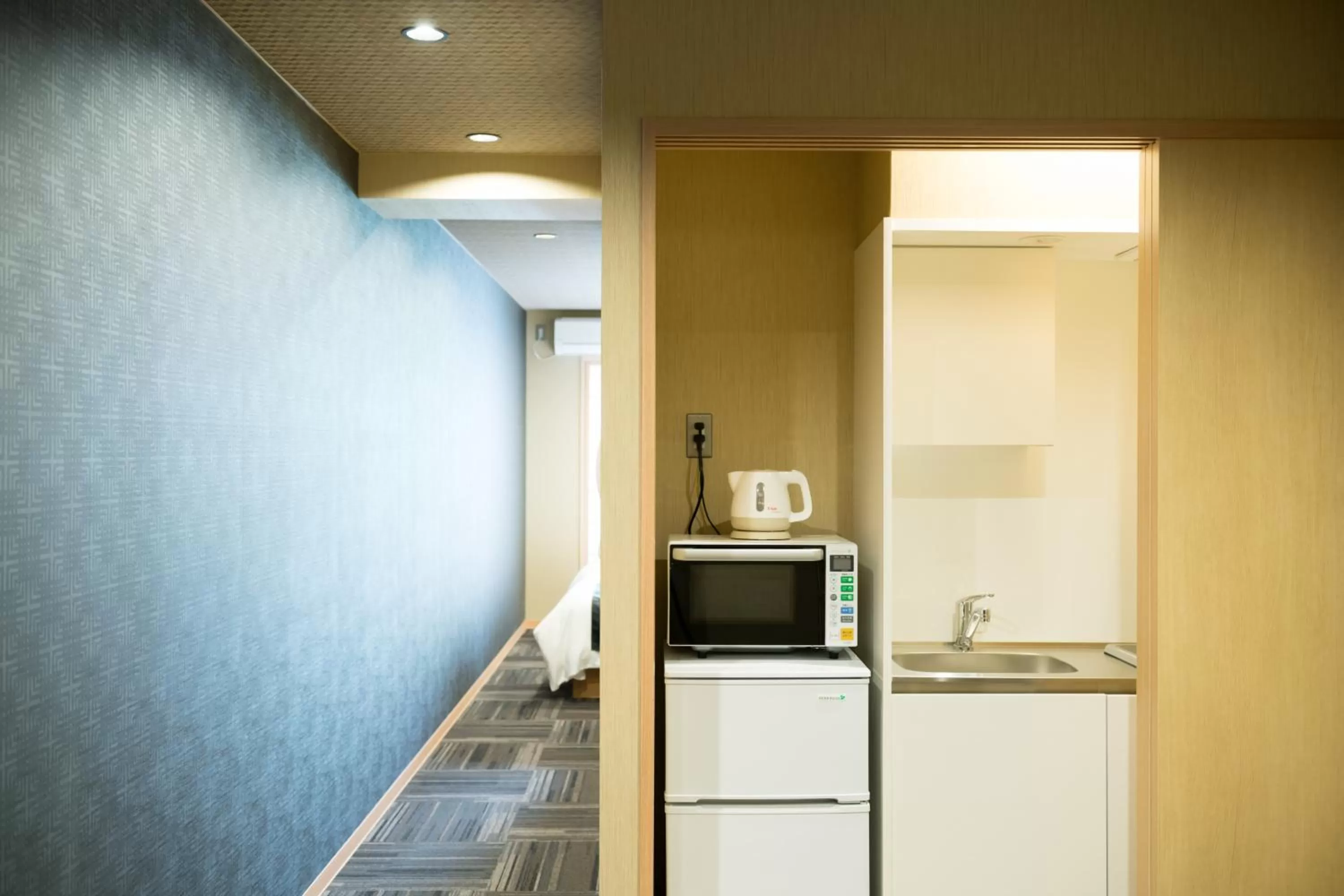 Kitchen or kitchenette in Shiki Suites - Kyoto Umekoji