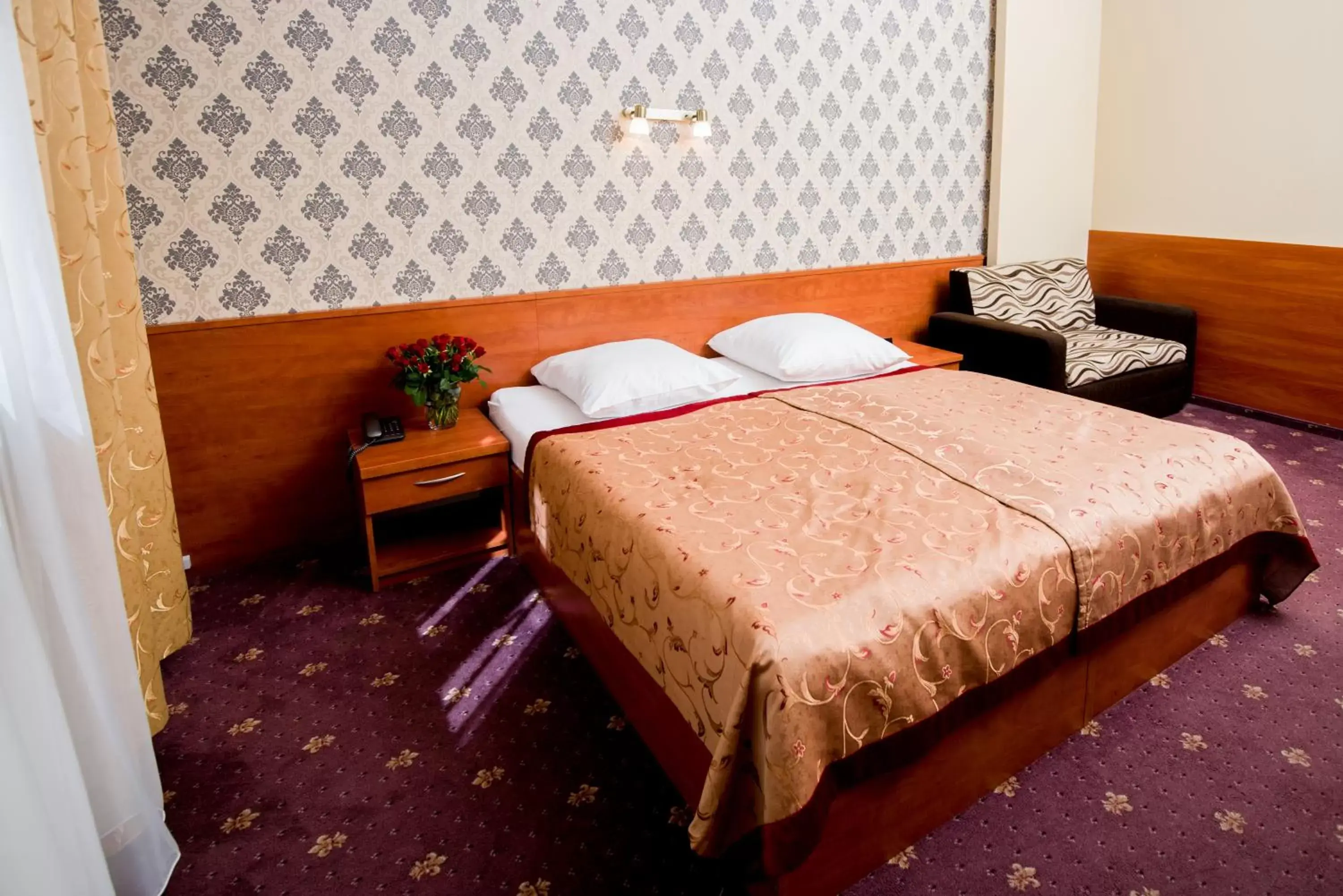 Bed in Hotel Maksymilian