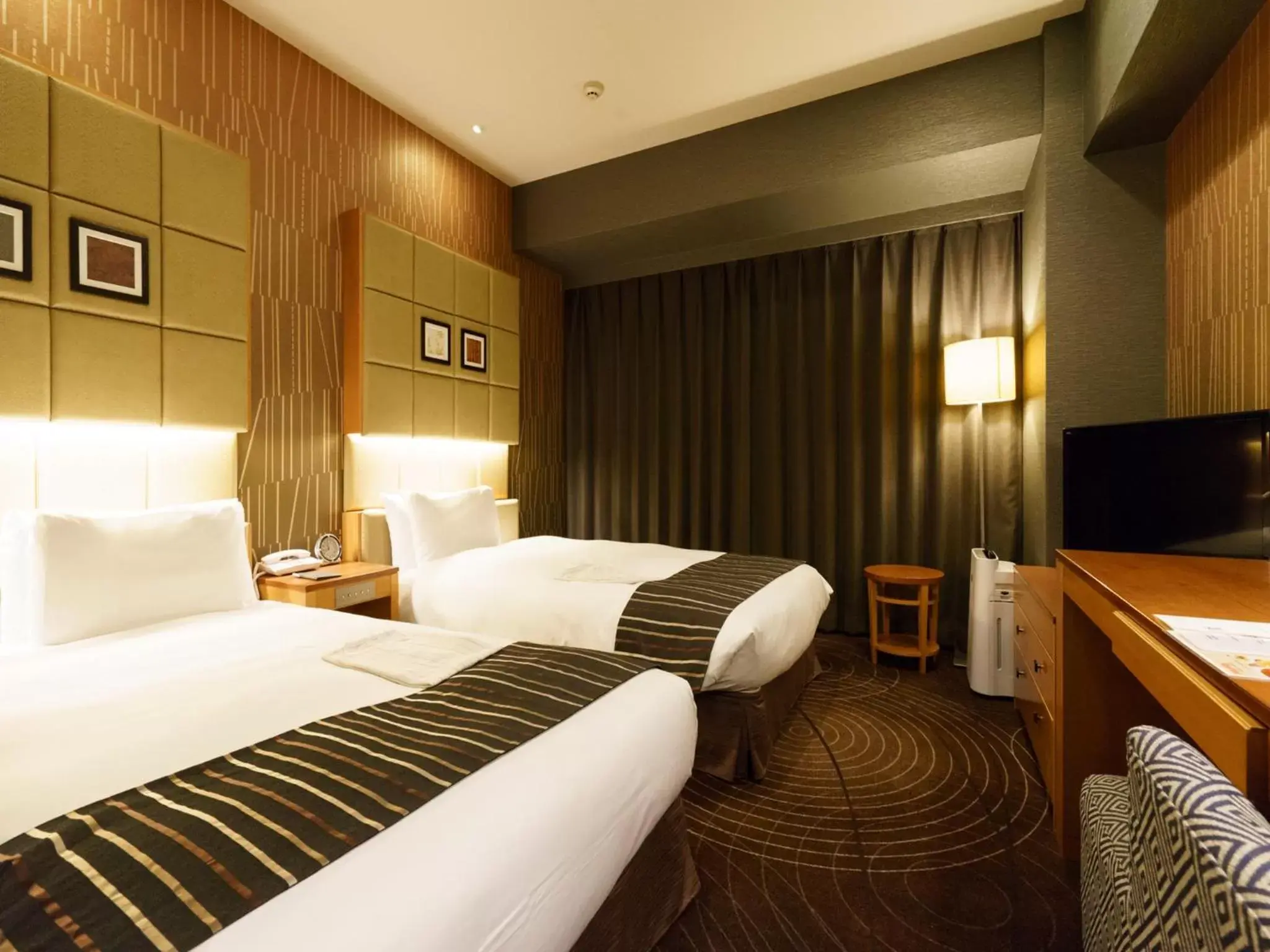 Bed in Sotetsu Fresa Inn Higashi Shinjuku Bed in Sotetsu Fresa Inn Higashi Shinjuku