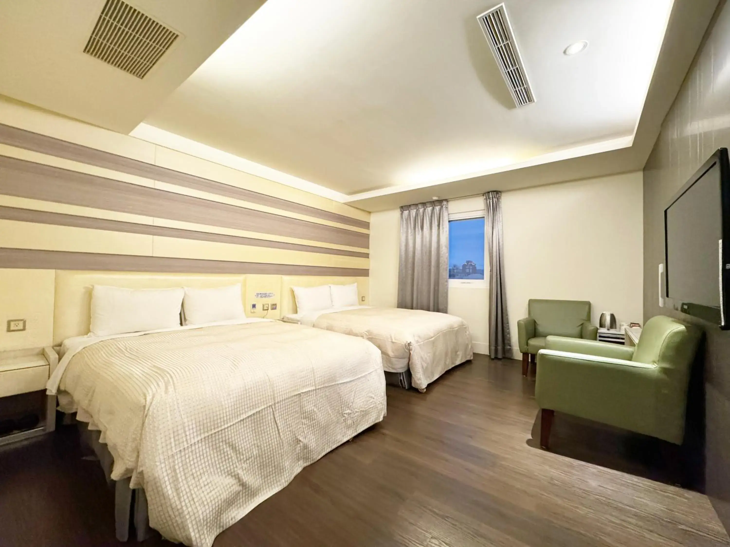 Photo of the whole room, Bed in Ai-Lai Fashion Hotel