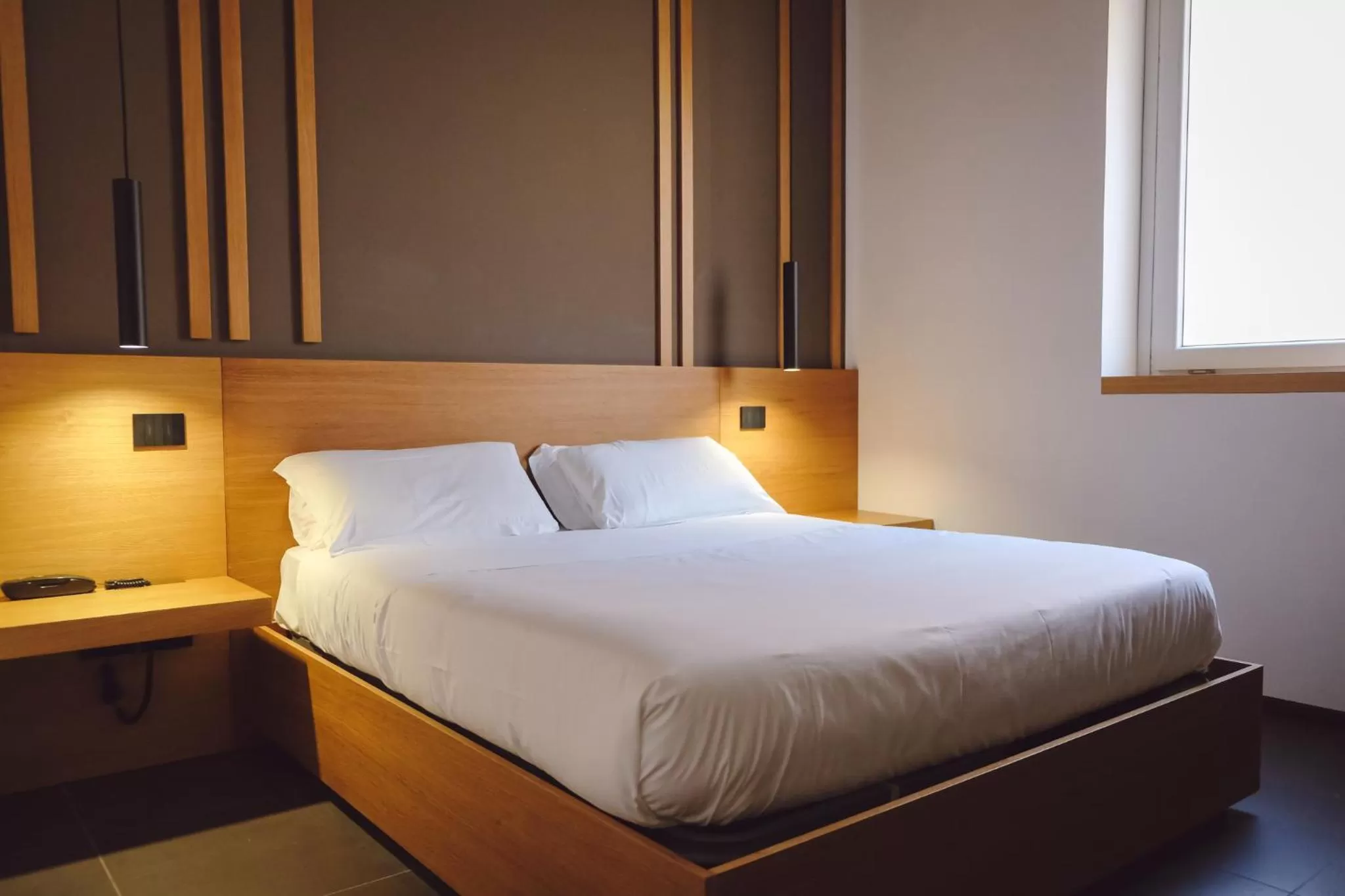 Bed in Central Lodge Hotel