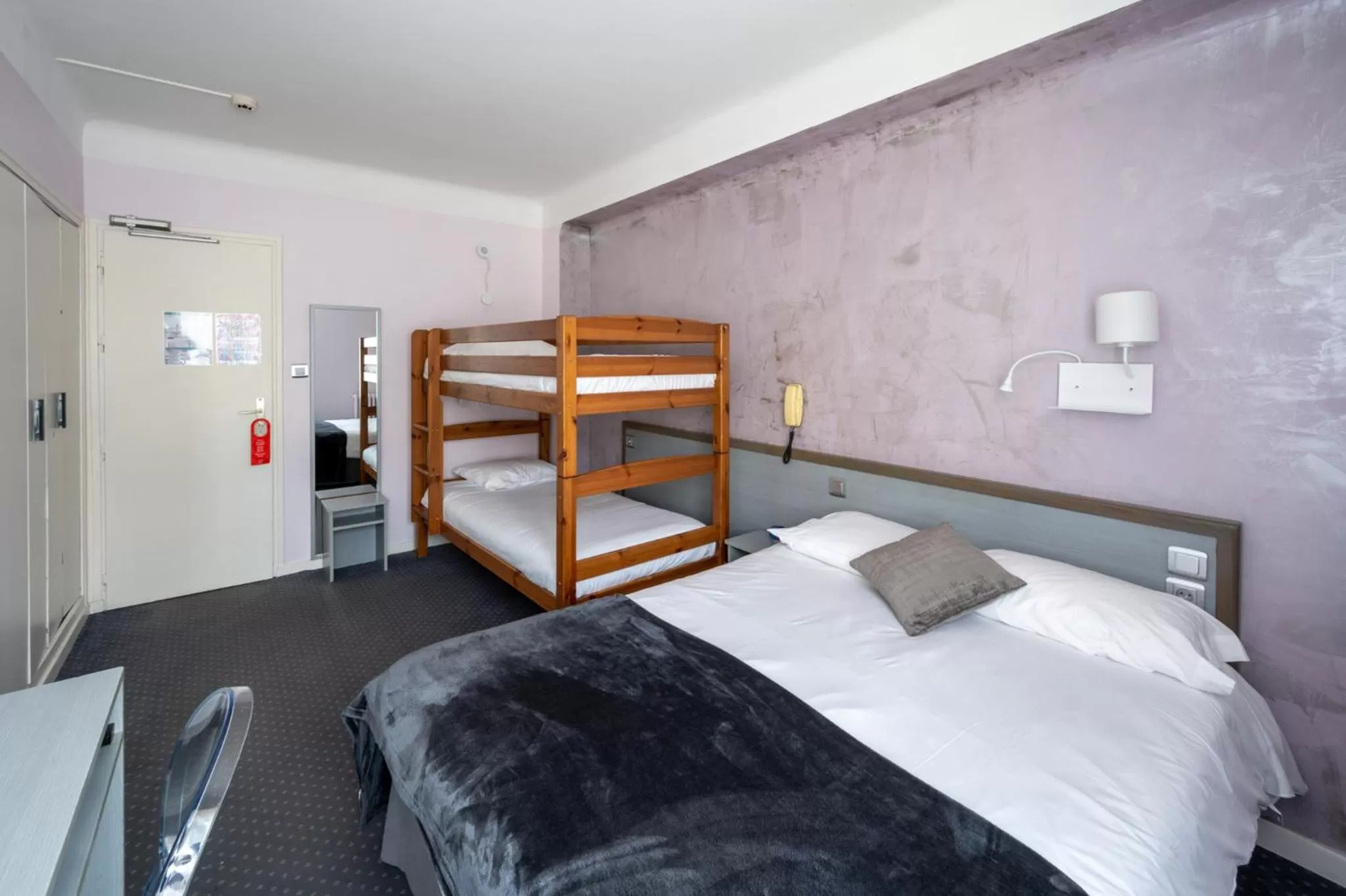 Bed in Hôtel du Soleil Levant