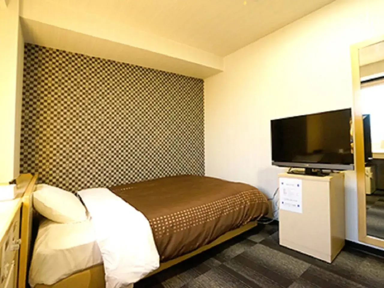 Bed in HOTEL LiVEMAX Kyoto Gojo