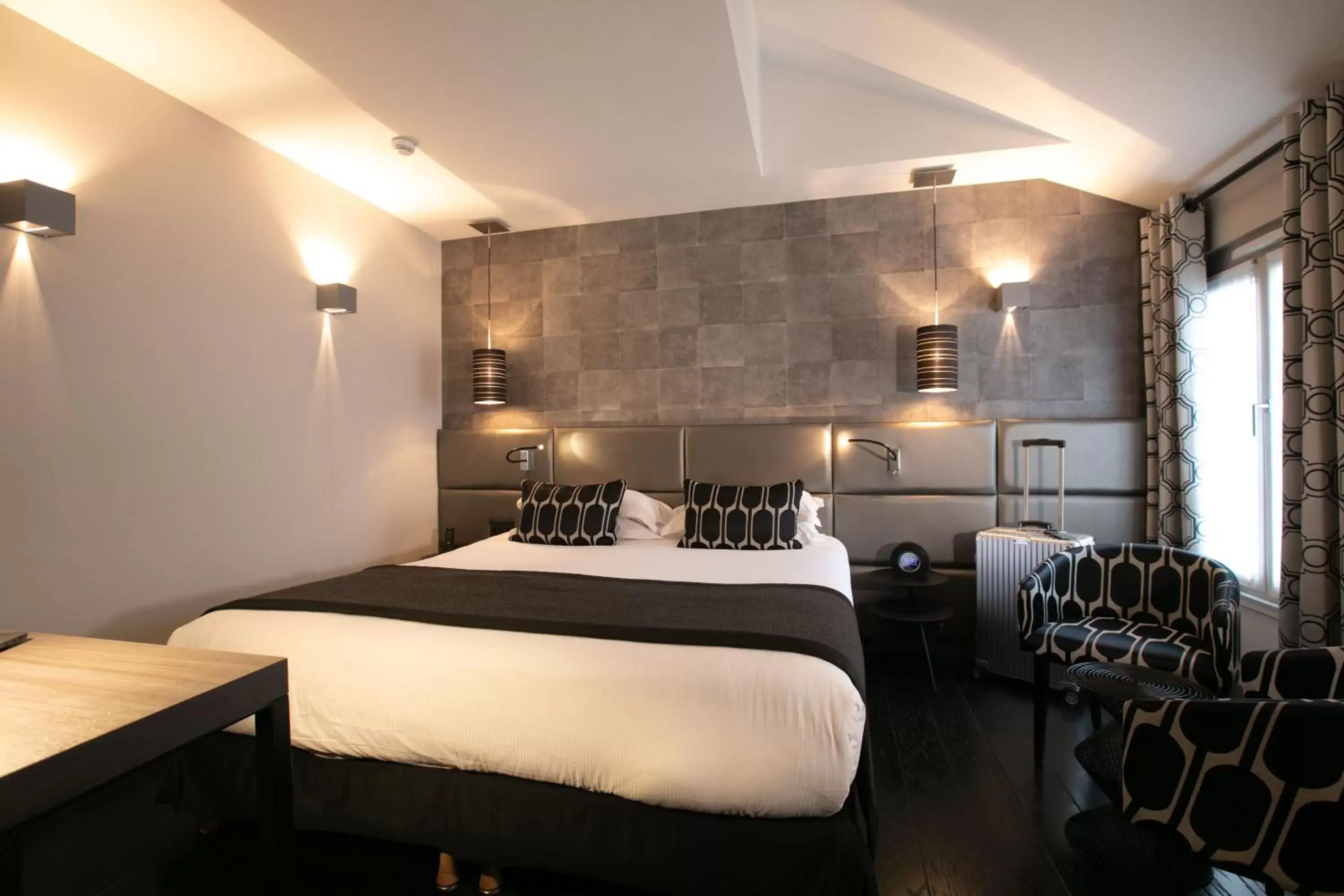 Bed in Le Grey Hotel