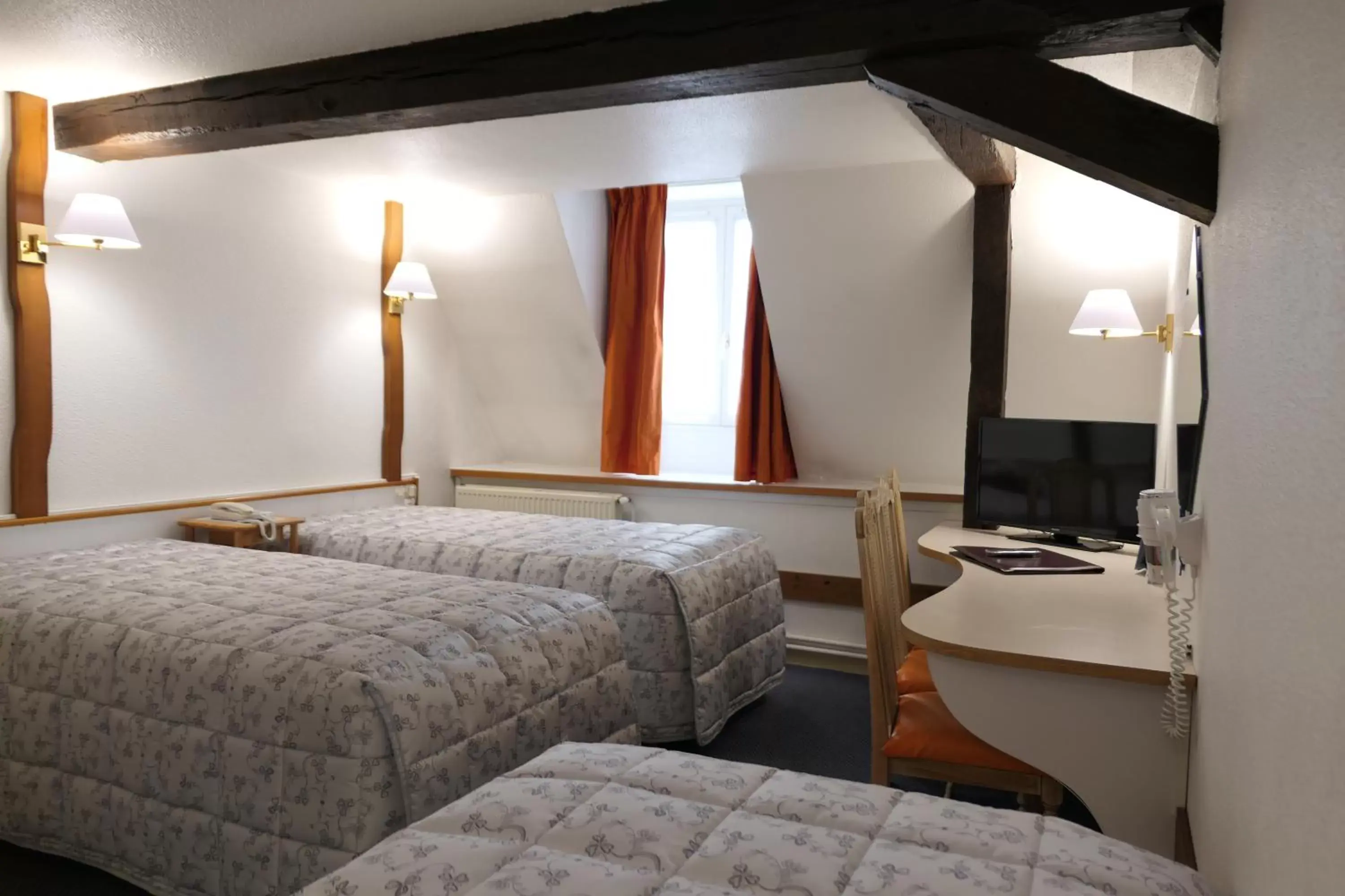 Bed in Hôtel Les Trois Luppars