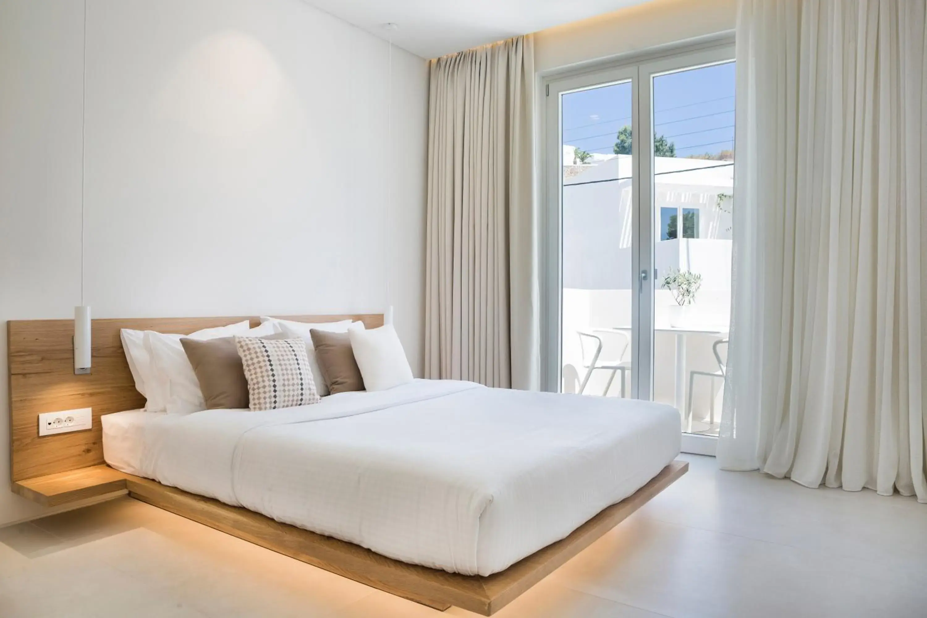 Bed in Mykonos Dove Beachfront Hotel