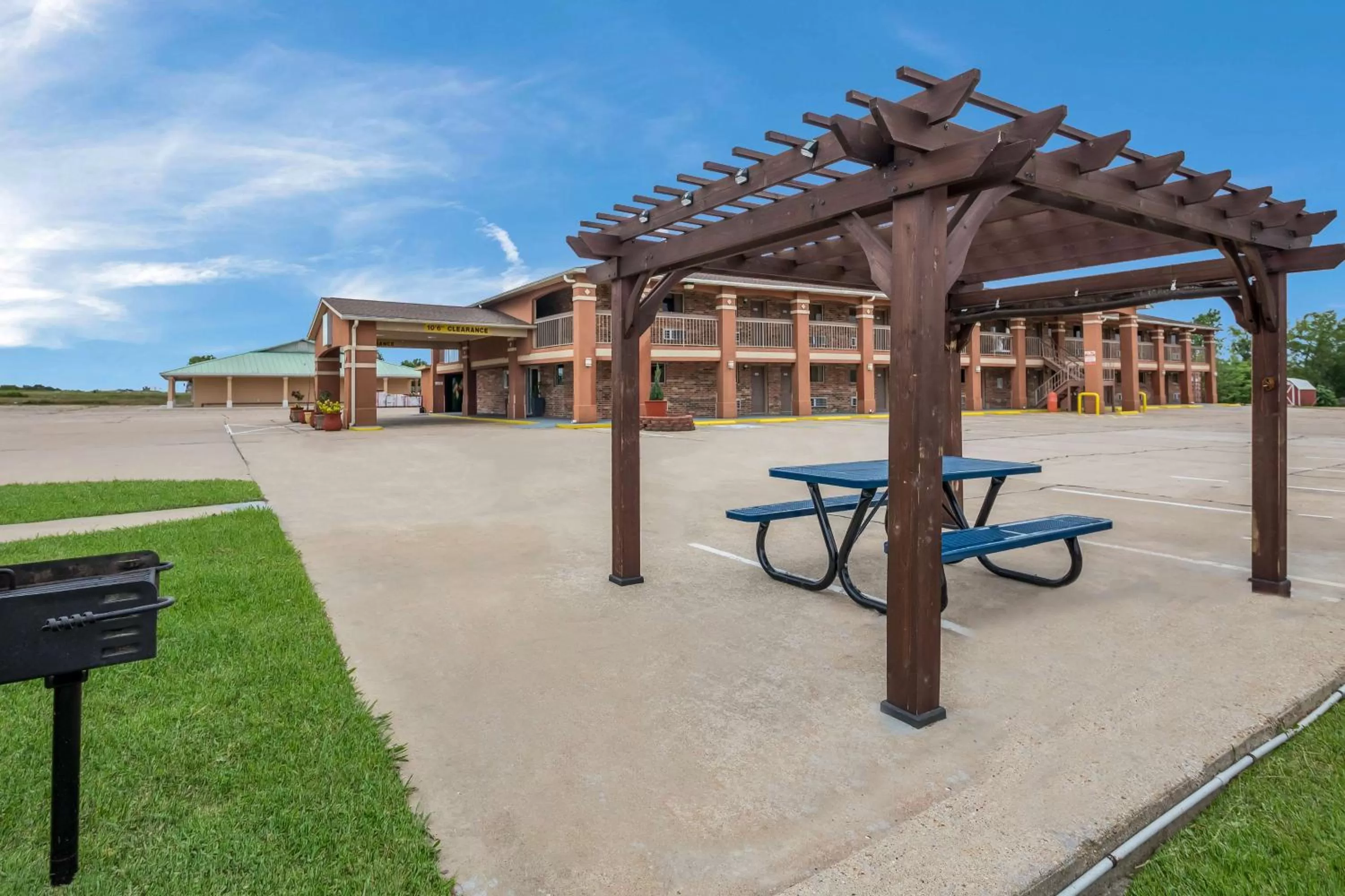 Property building in SureStay Hotel by Best Western Rockdale