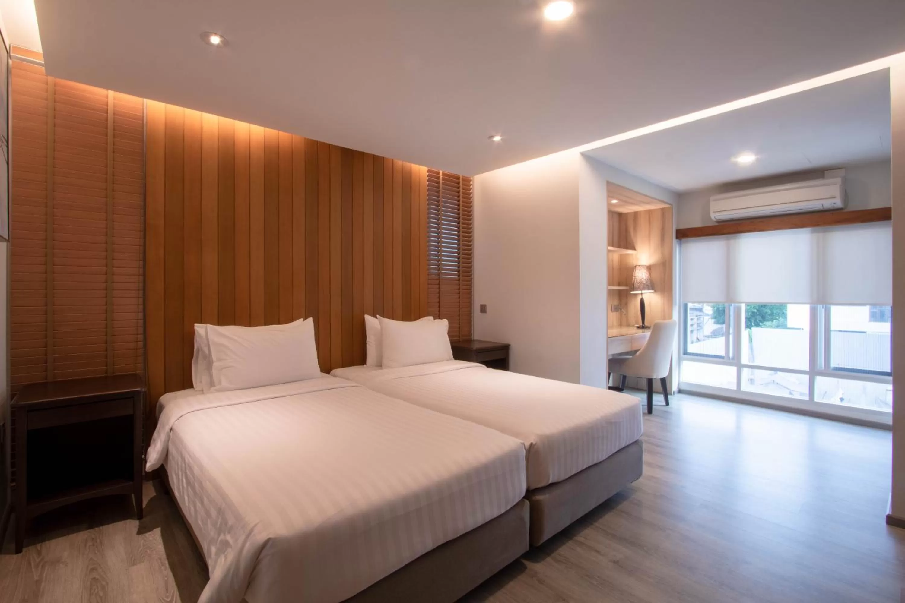 Bed in The Residence Rajtaevee Hotel