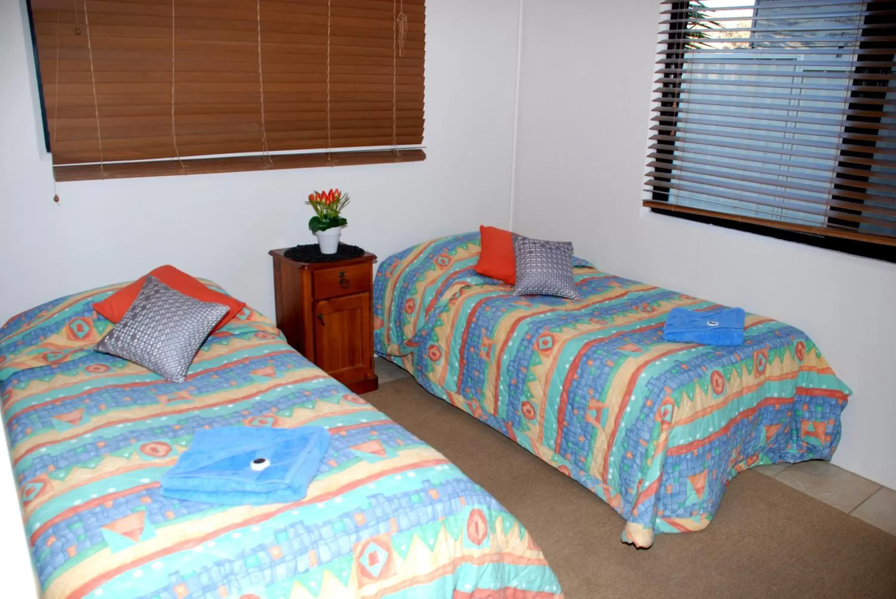 Bed in Amberoo Apartments
