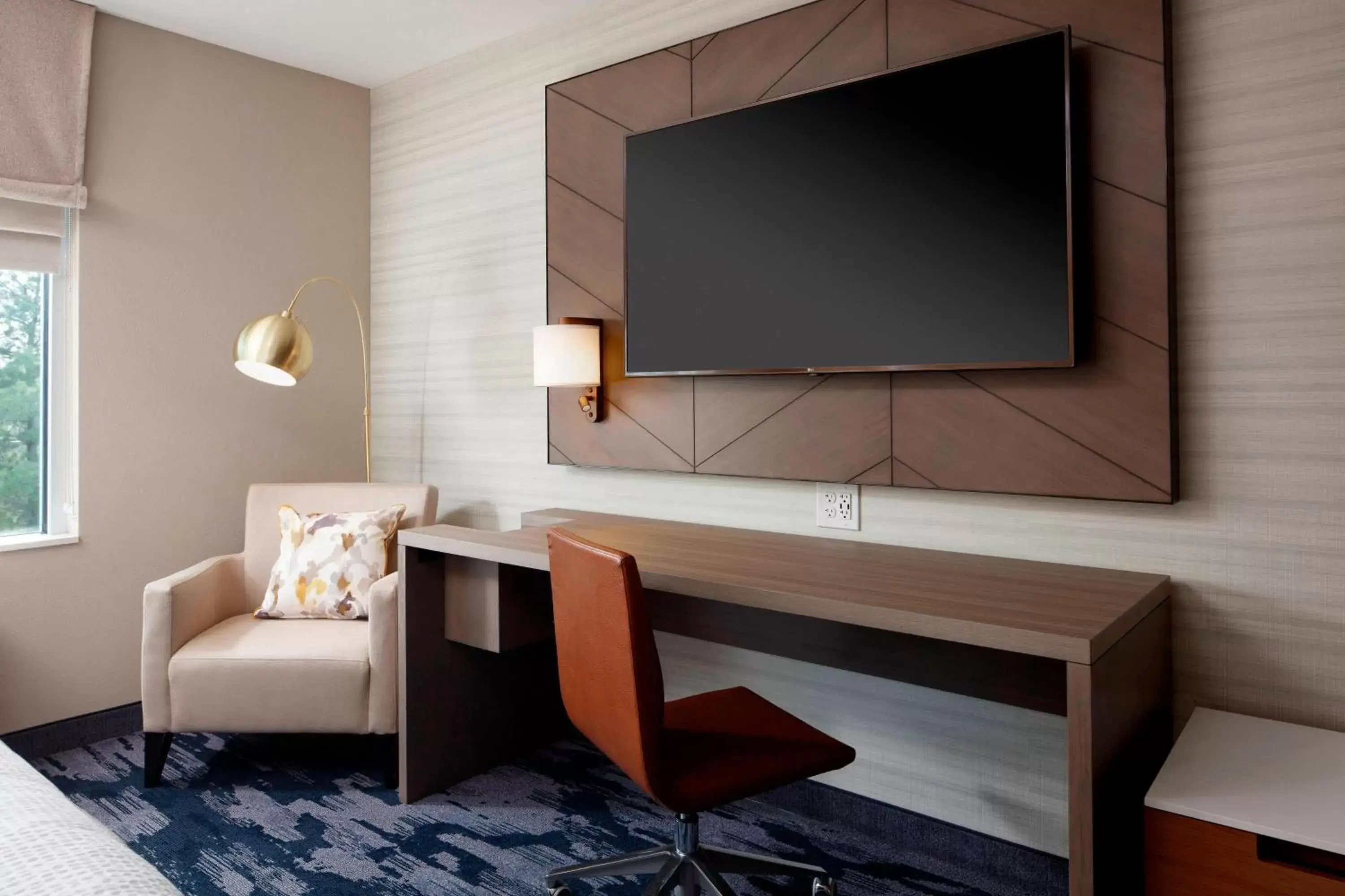 Photo of the whole room, TV/Entertainment Center in Fairfield Inn & Suites By Marriott Louisville Northeast