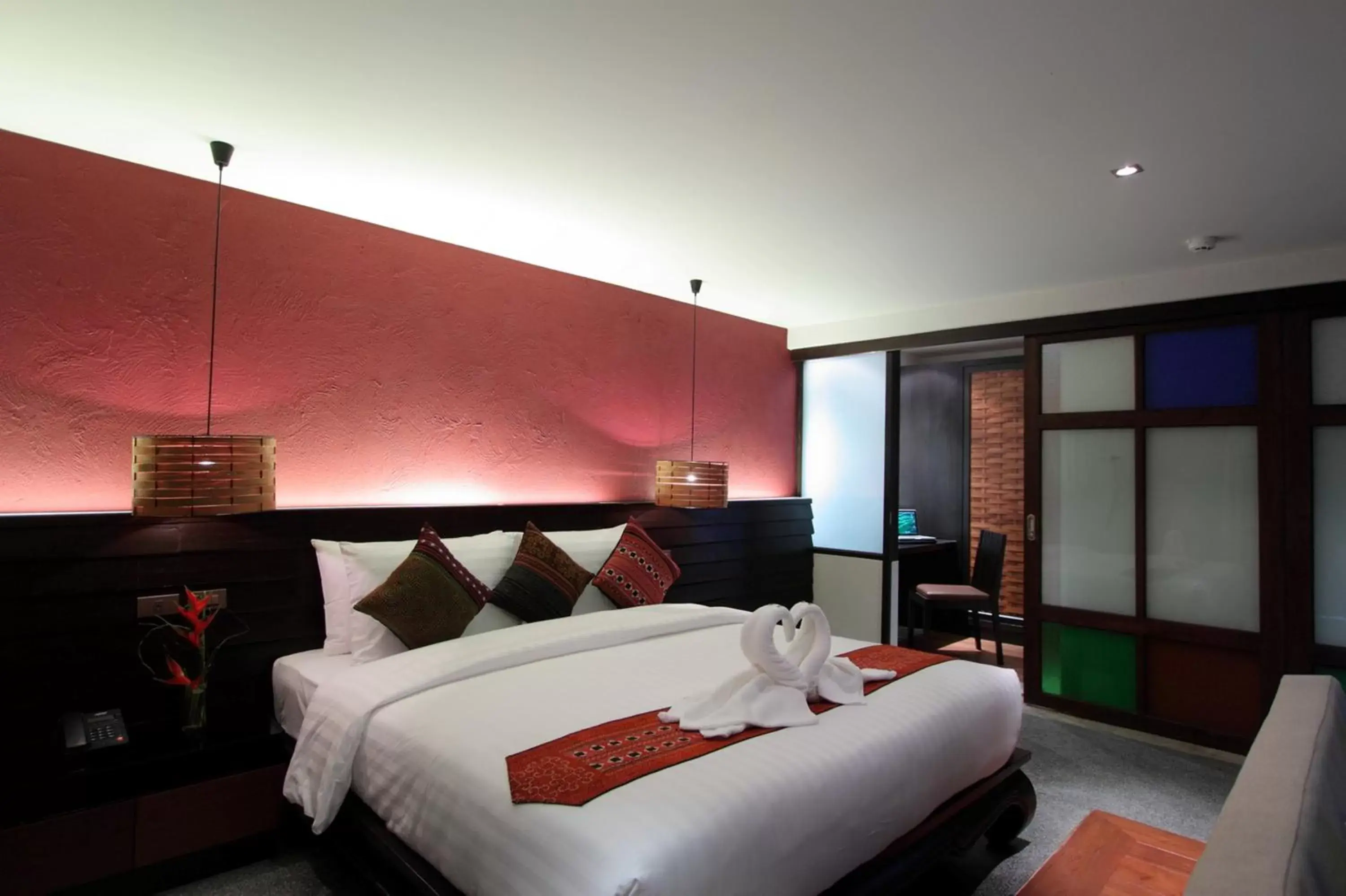 Bed in De Lanna Hotel