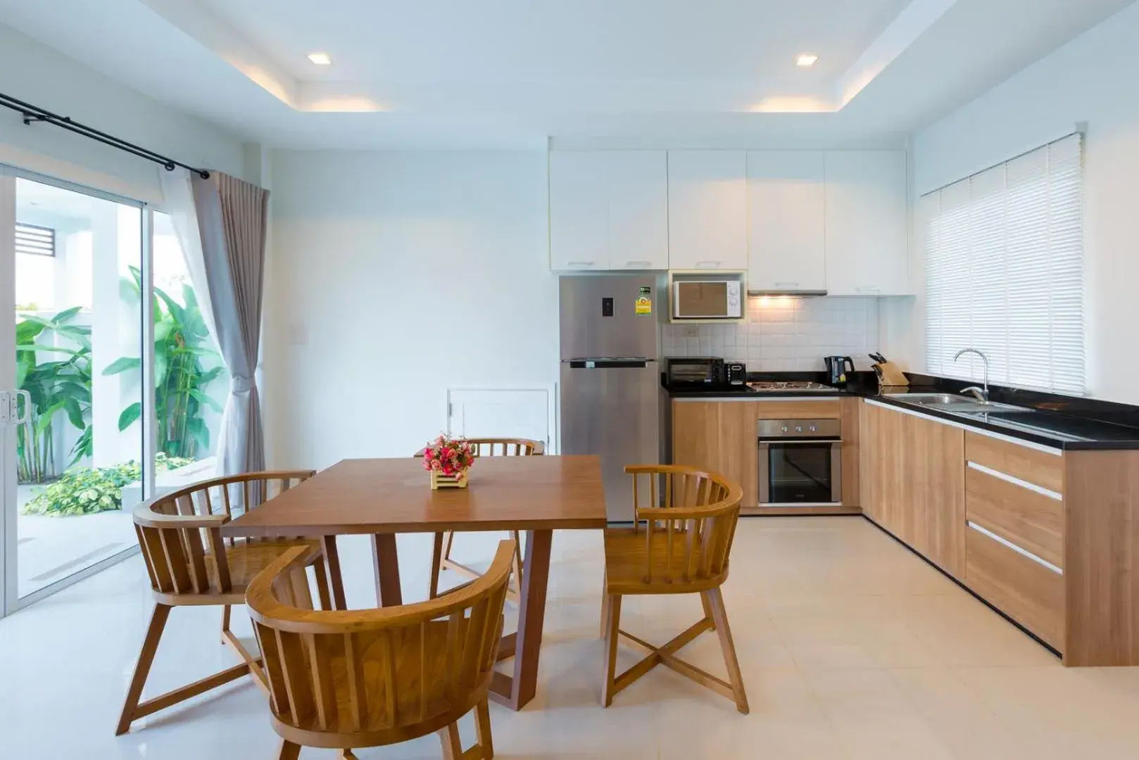 Dining area, Kitchen/Kitchenette in Sivana Villas Hua Hin