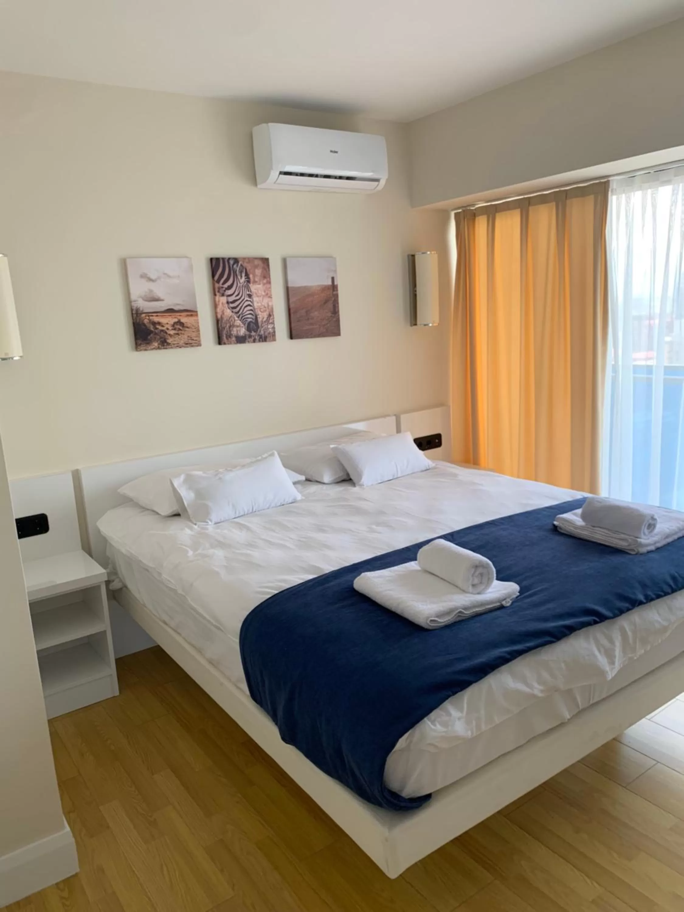 Bed in Orbi City Luxury Suite