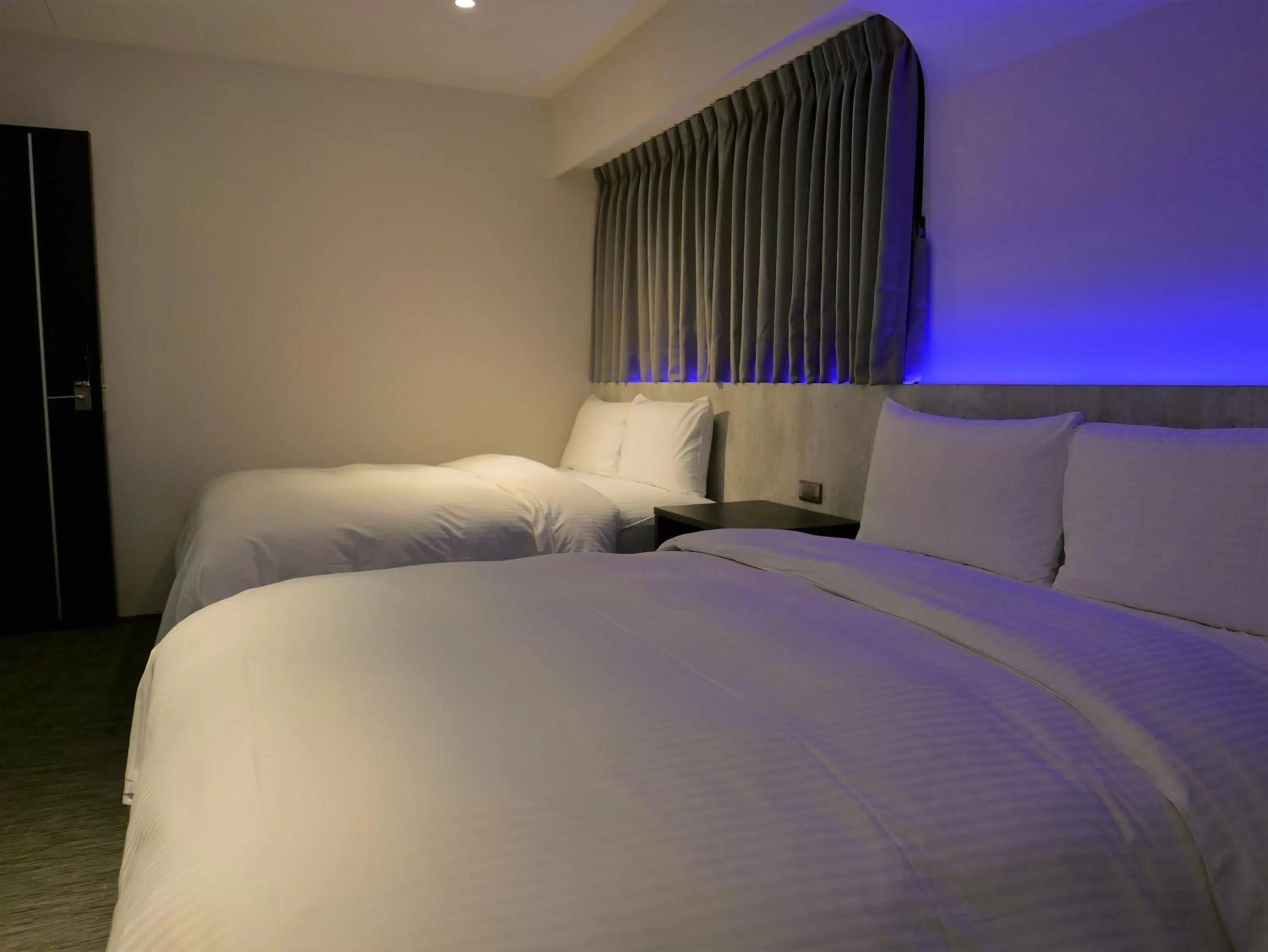 Bed in 泊居旅店二館 Oursinn Hotel 2