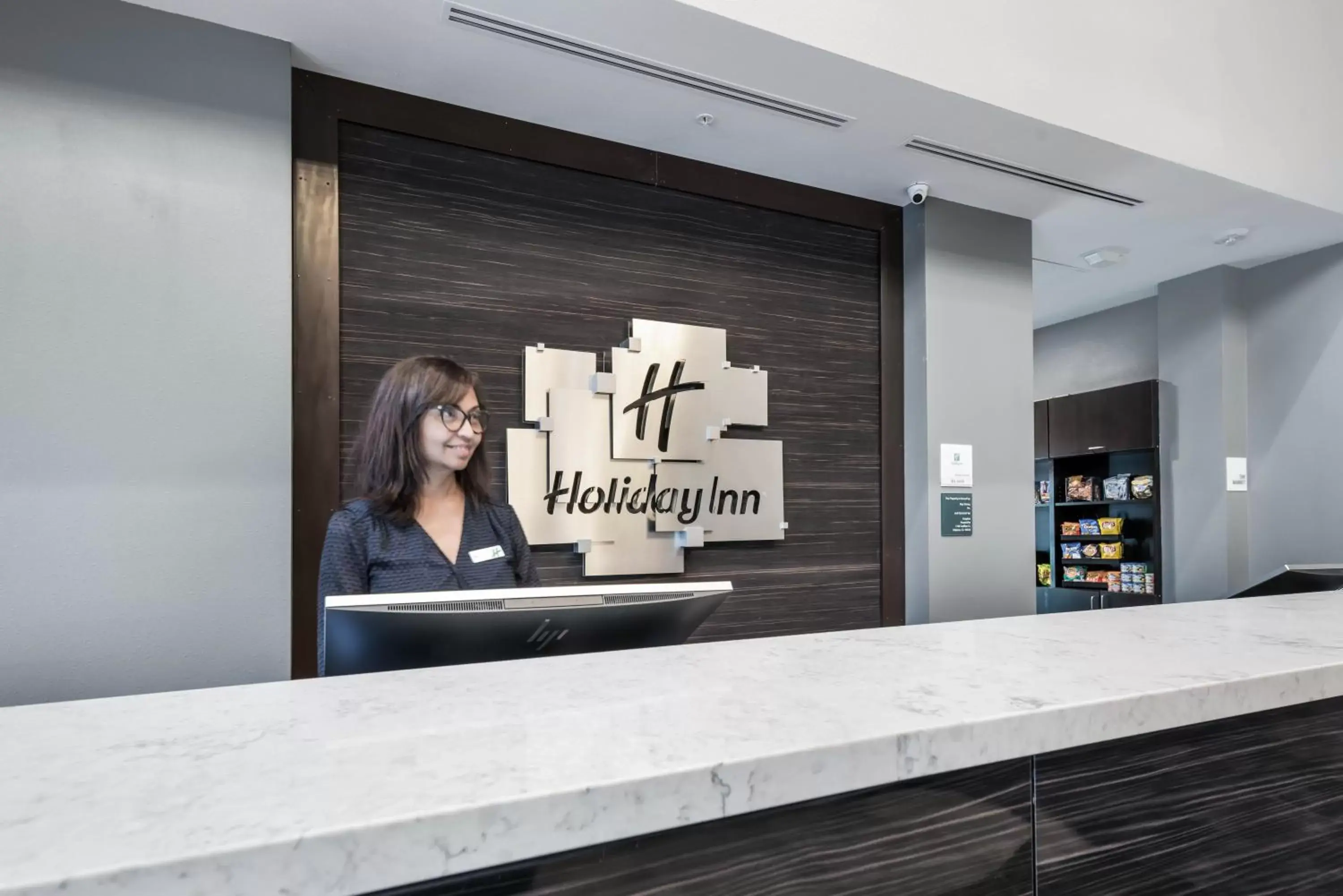 Property building, Lobby/Reception in Holiday Inn Hotel & Suites Silicon Valley – Milpitas, an IHG Hotel