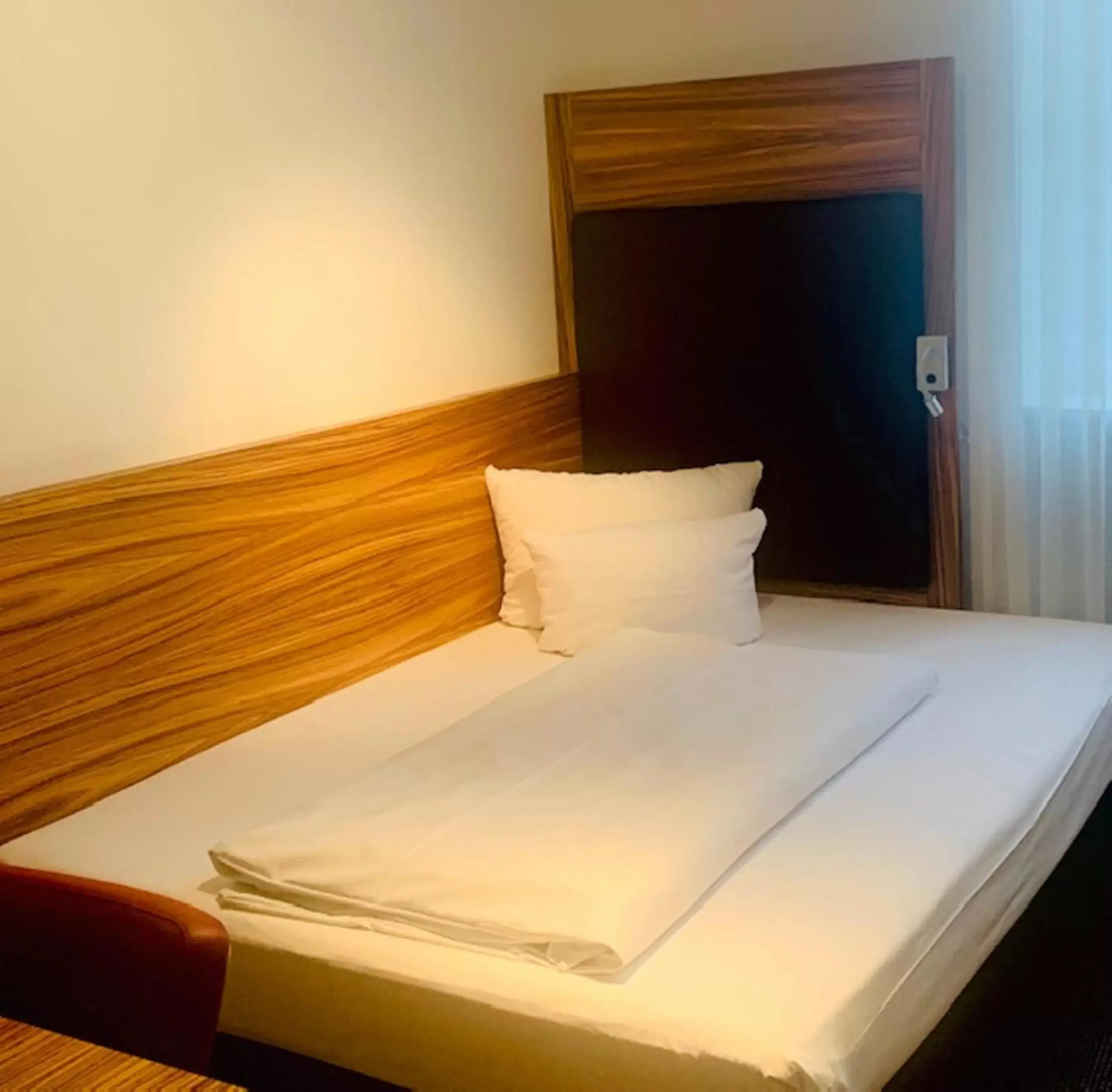 Bed in ACHAT Hotel Regensburg Herzog am Dom