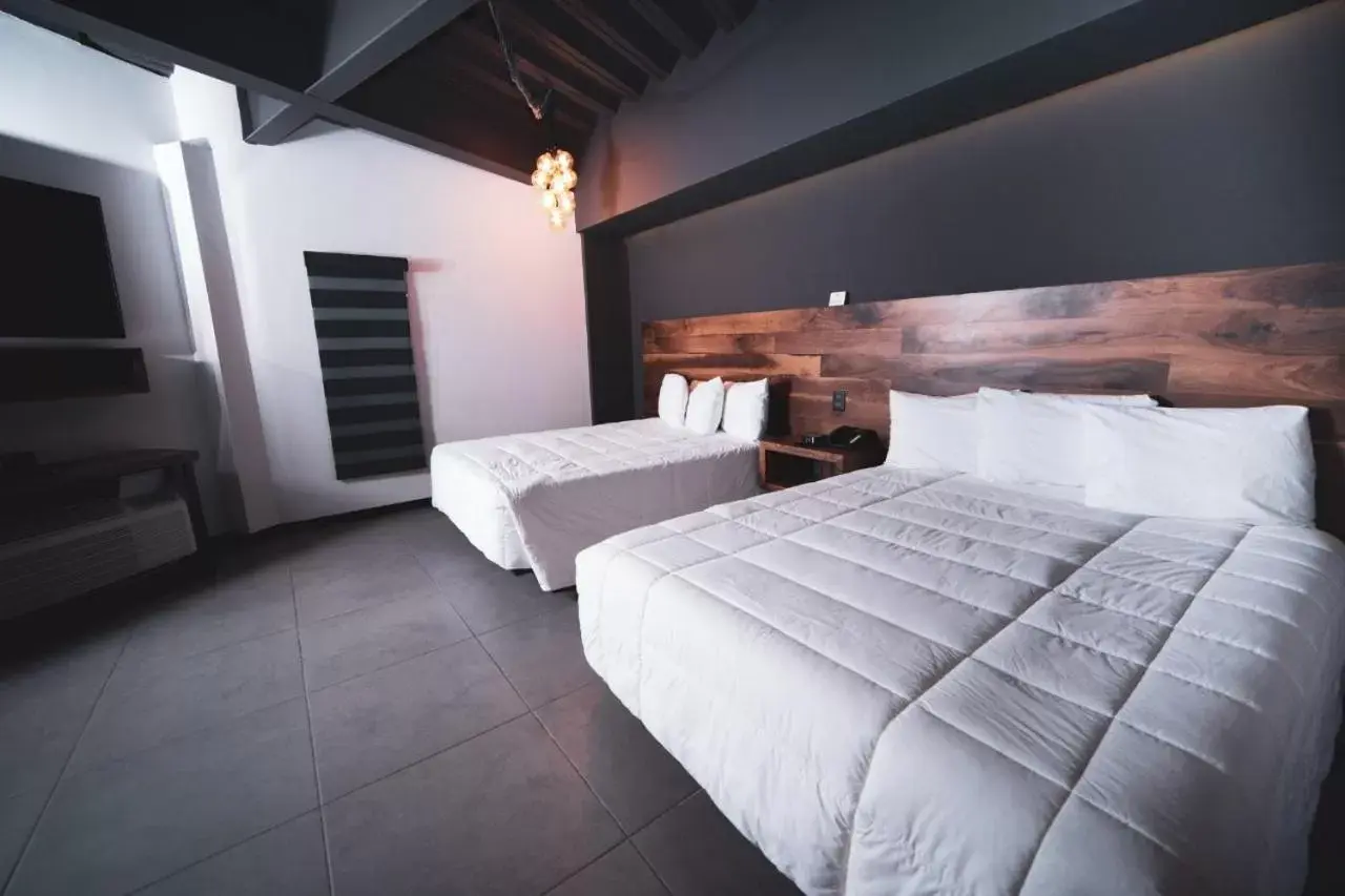 Bed in HOTEL RIO RITA