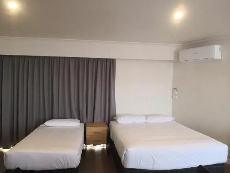 Bed in Dandenong Motel
