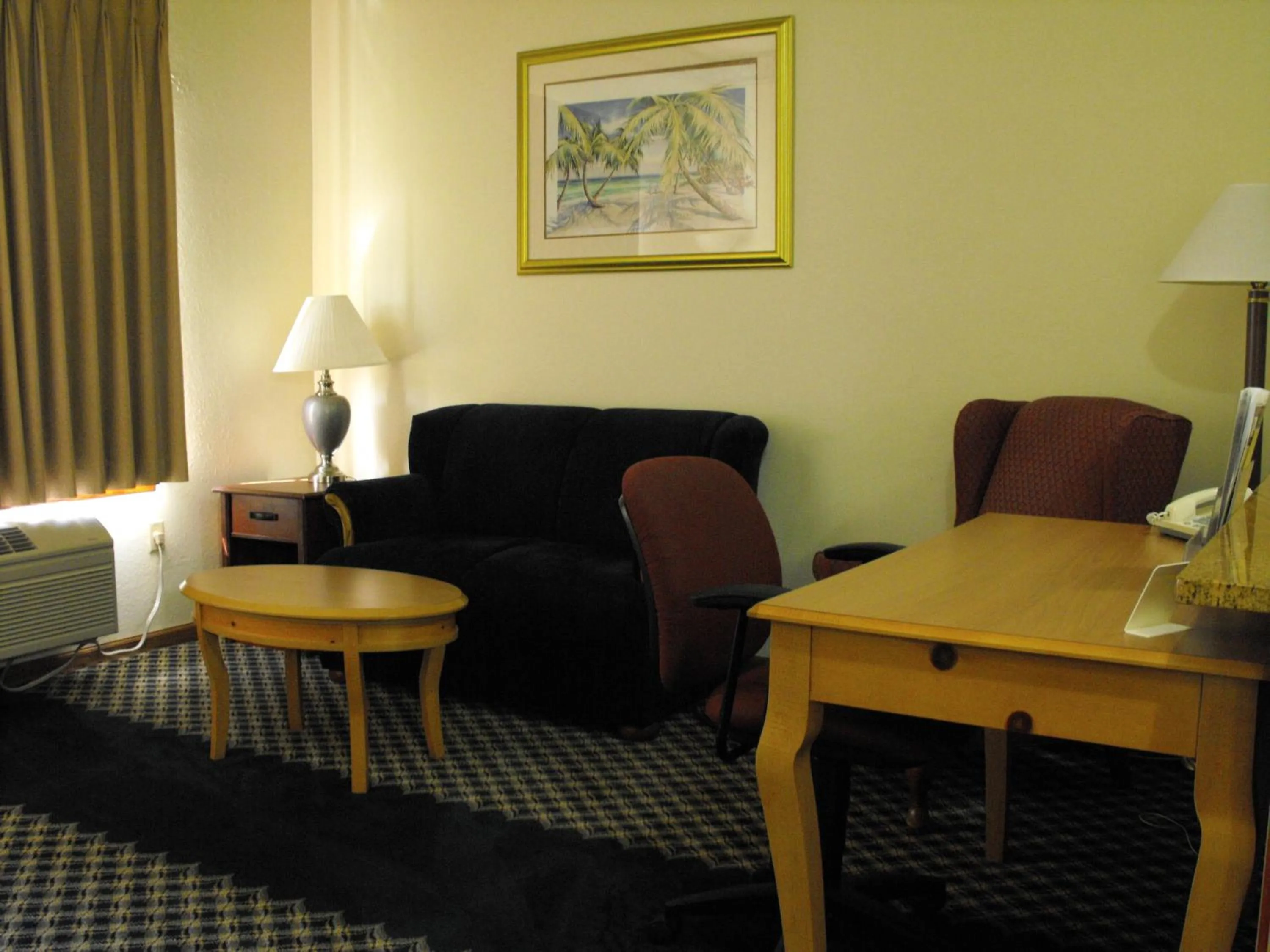 Living room in Americas Best Value Inn Three Rivers