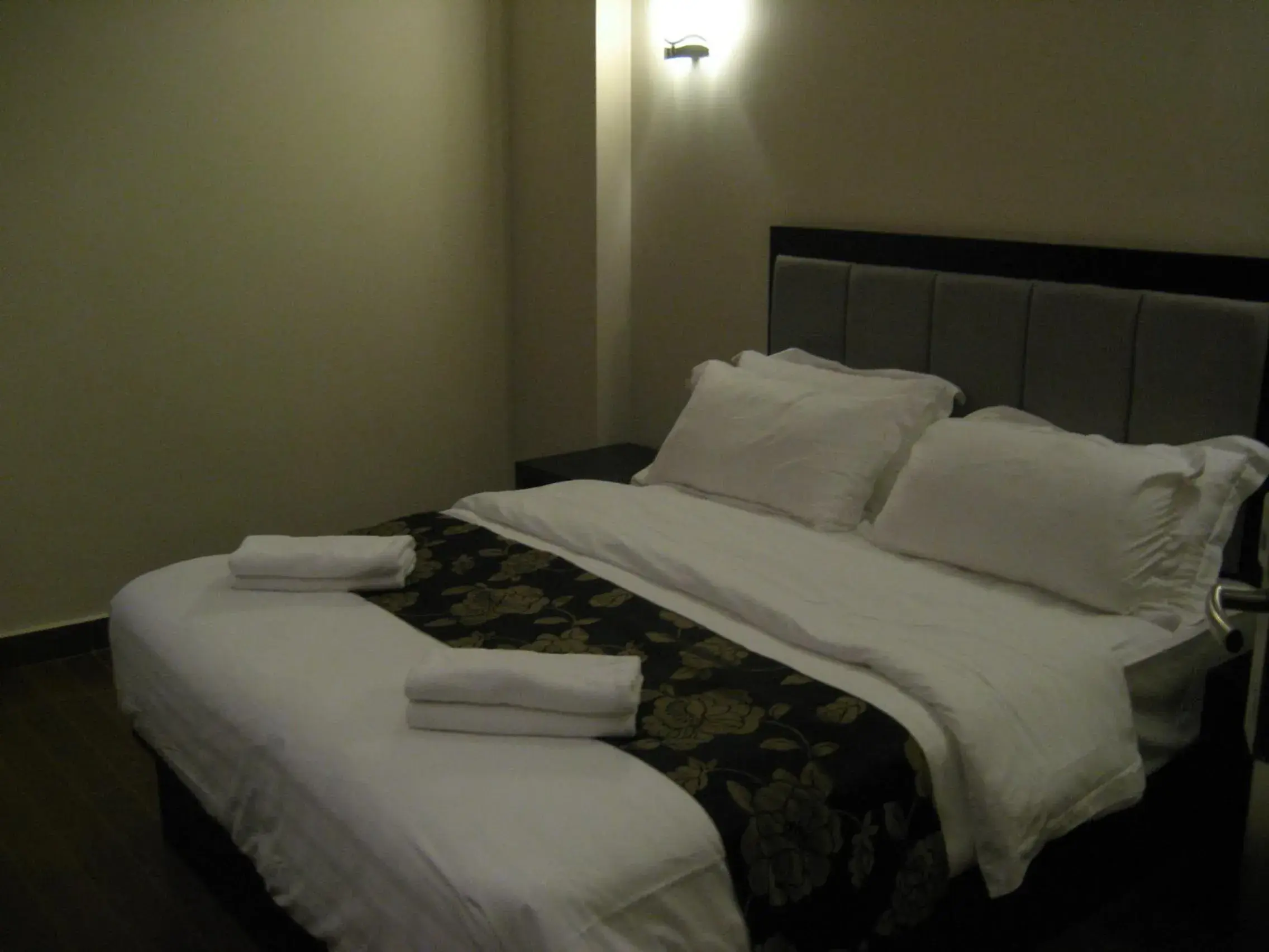 Bed in Kk Waterfront Hotel