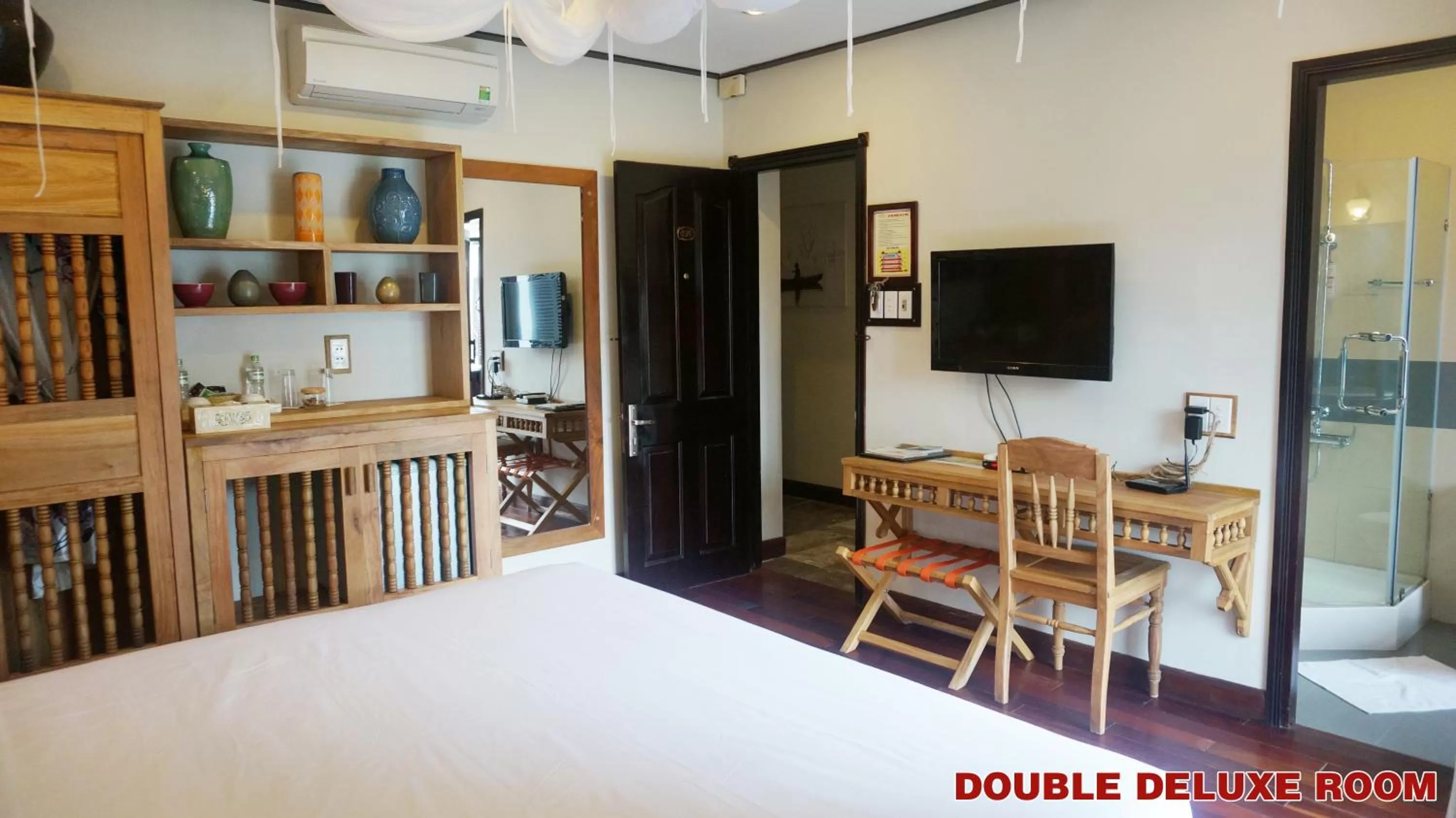 Bed in Hoi An Pho Library Hotel