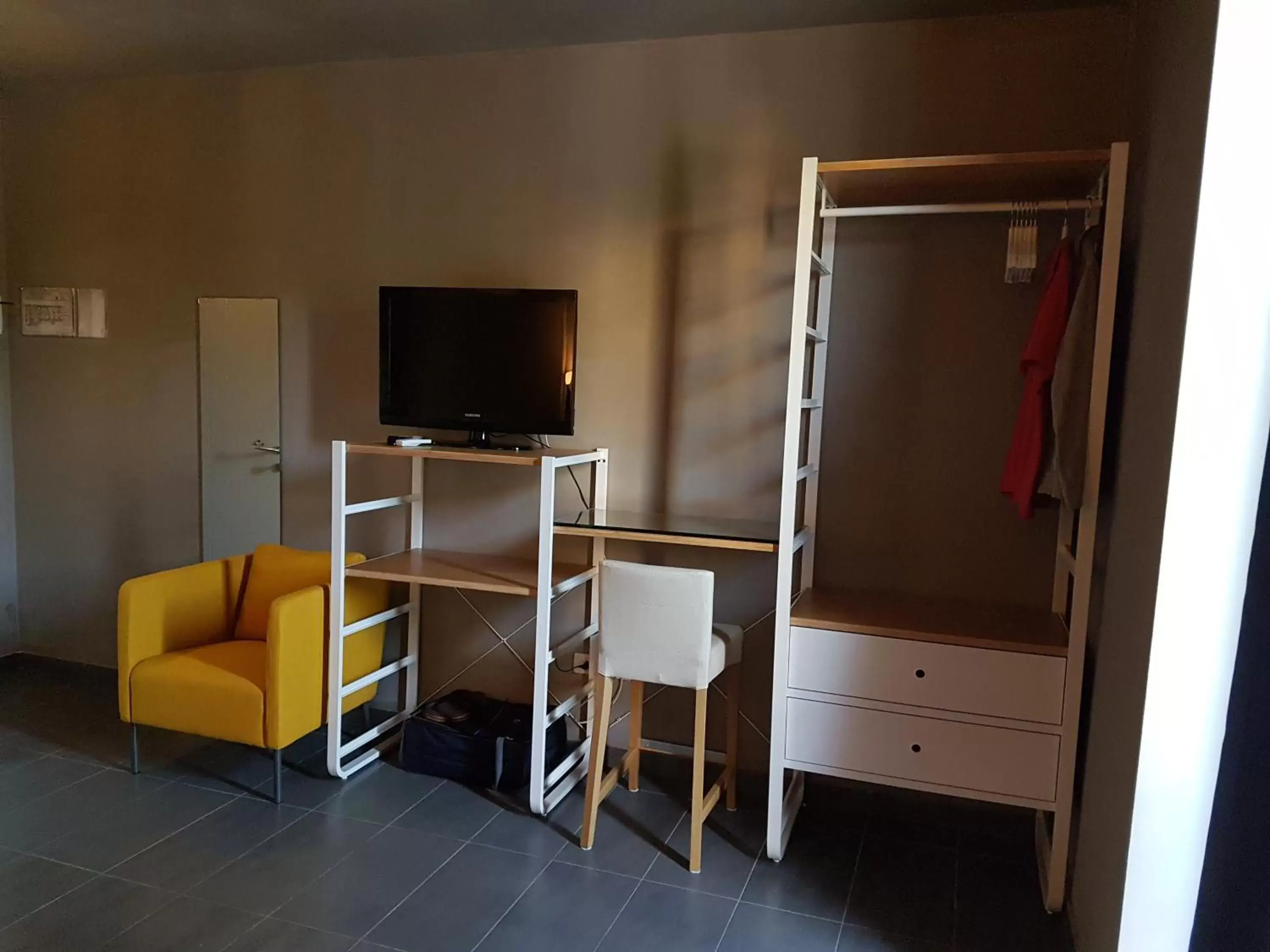 Photo of the whole room, TV/Entertainment Center in Dannunziano Aparthotel