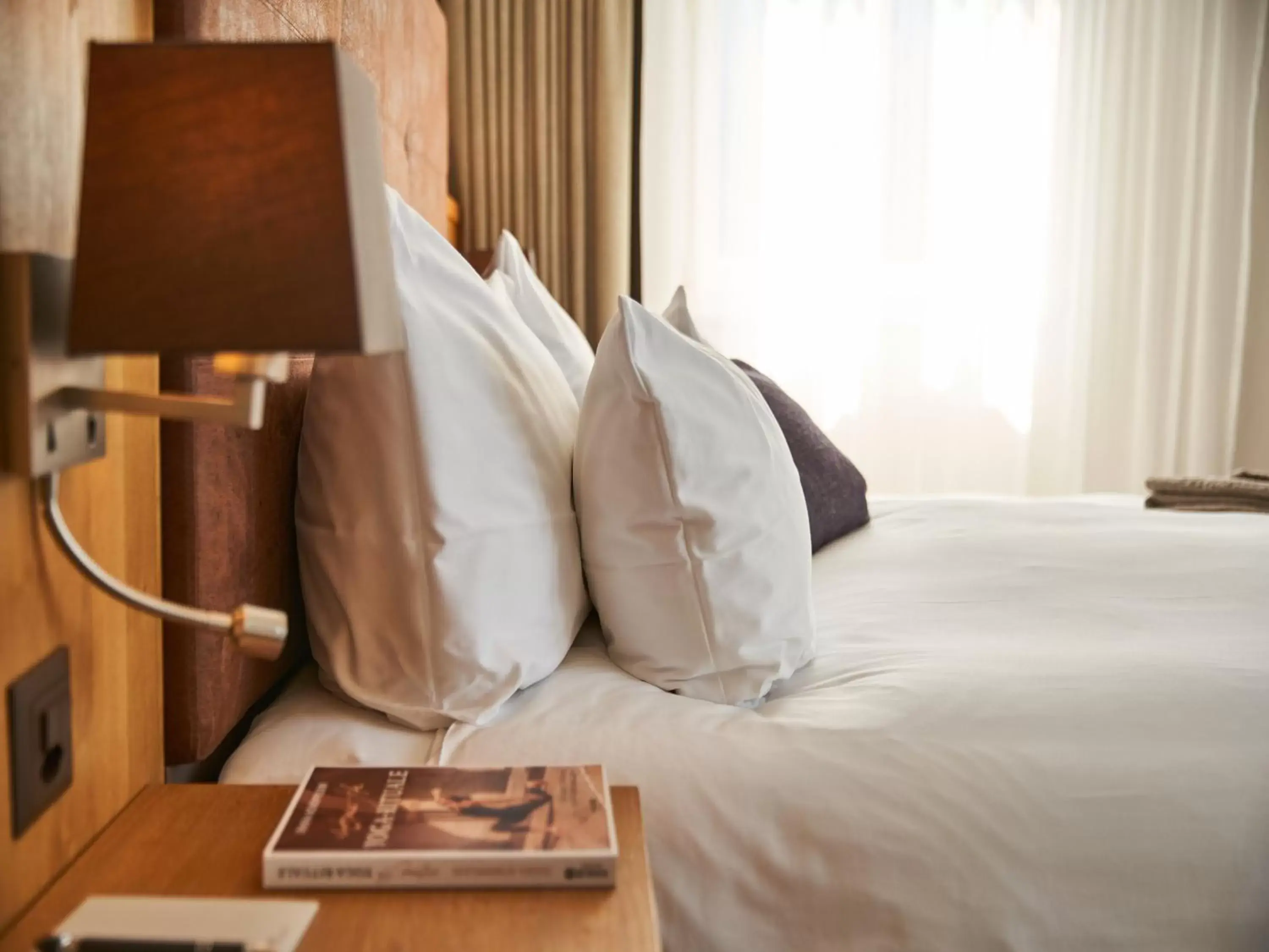 Bed in Victoria - Alpine Boutique Hotel & Fine Dining