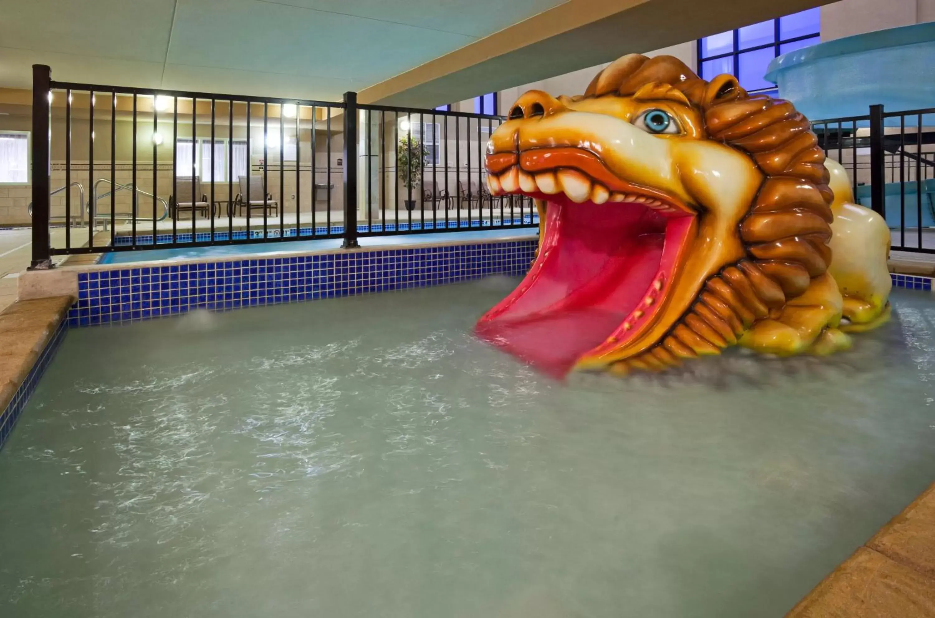 Swimming pool in Holiday Inn Express & Suites Mitchell, an IHG Hotel