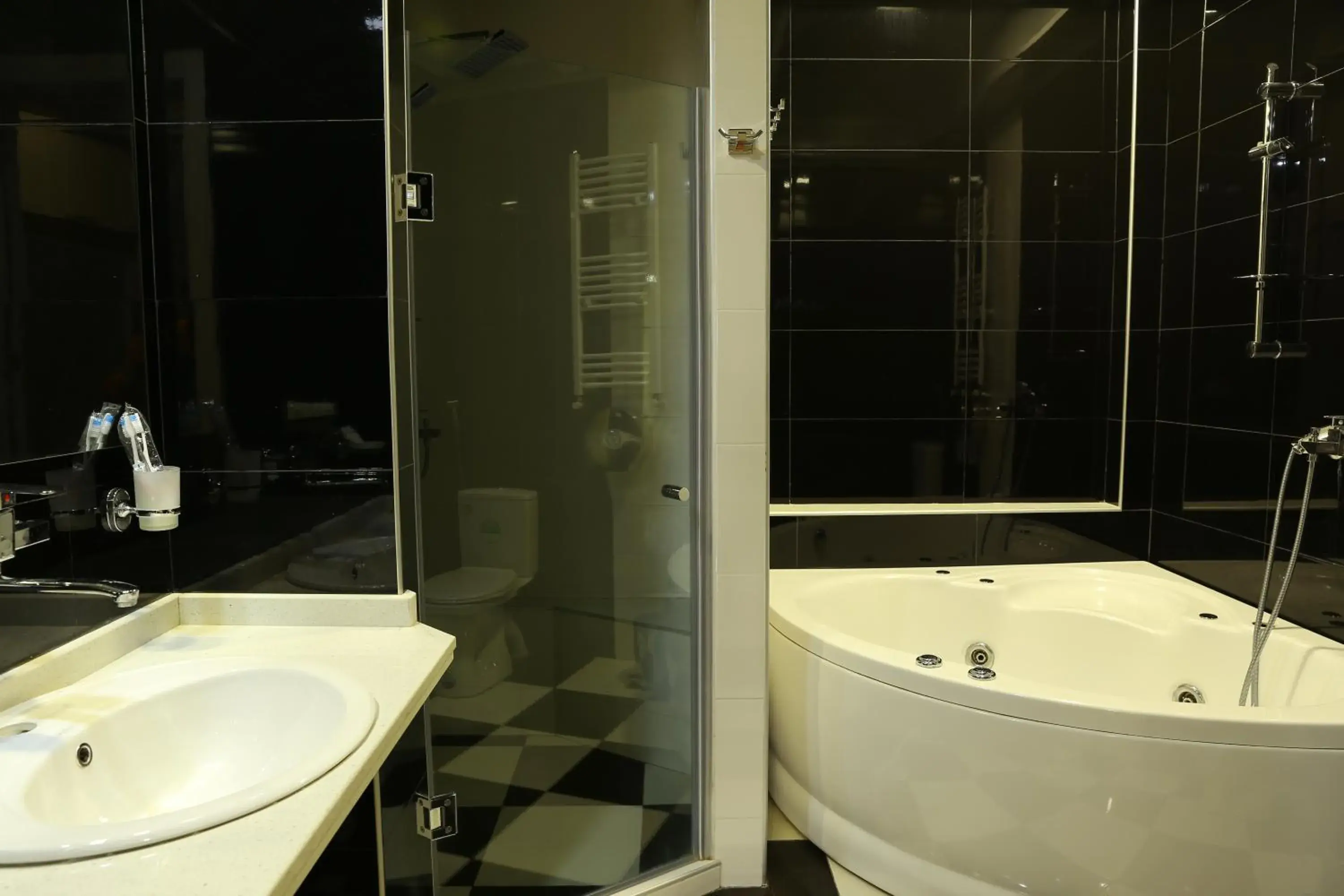 Bathroom in Dkd-bridge Hotel