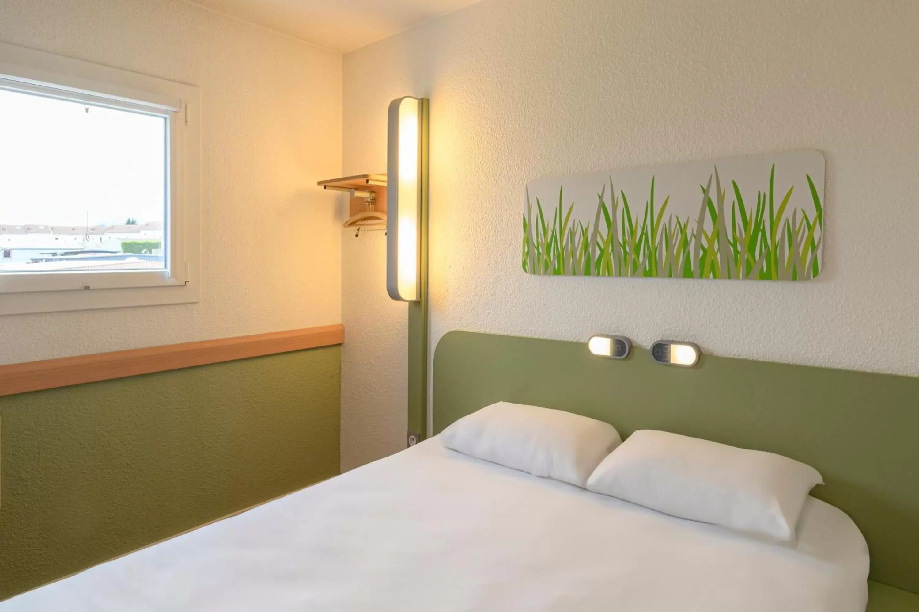Photo of the whole room, Bed in Ibis budget Saint-Étienne stade