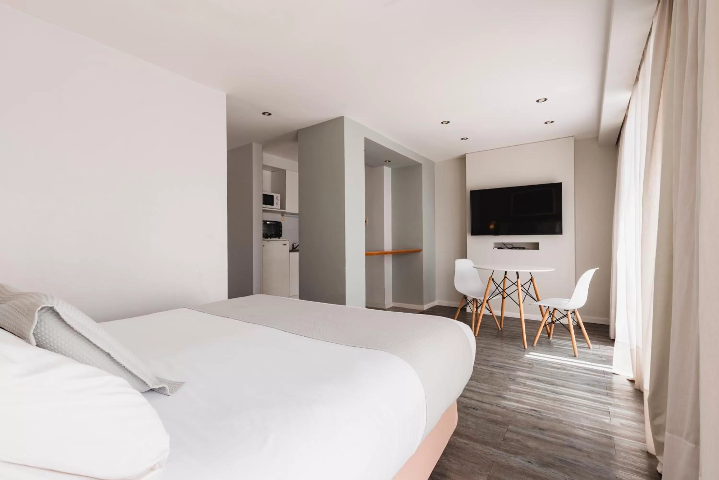 Photo of the whole room, Bed in Punta Trouville Hotel