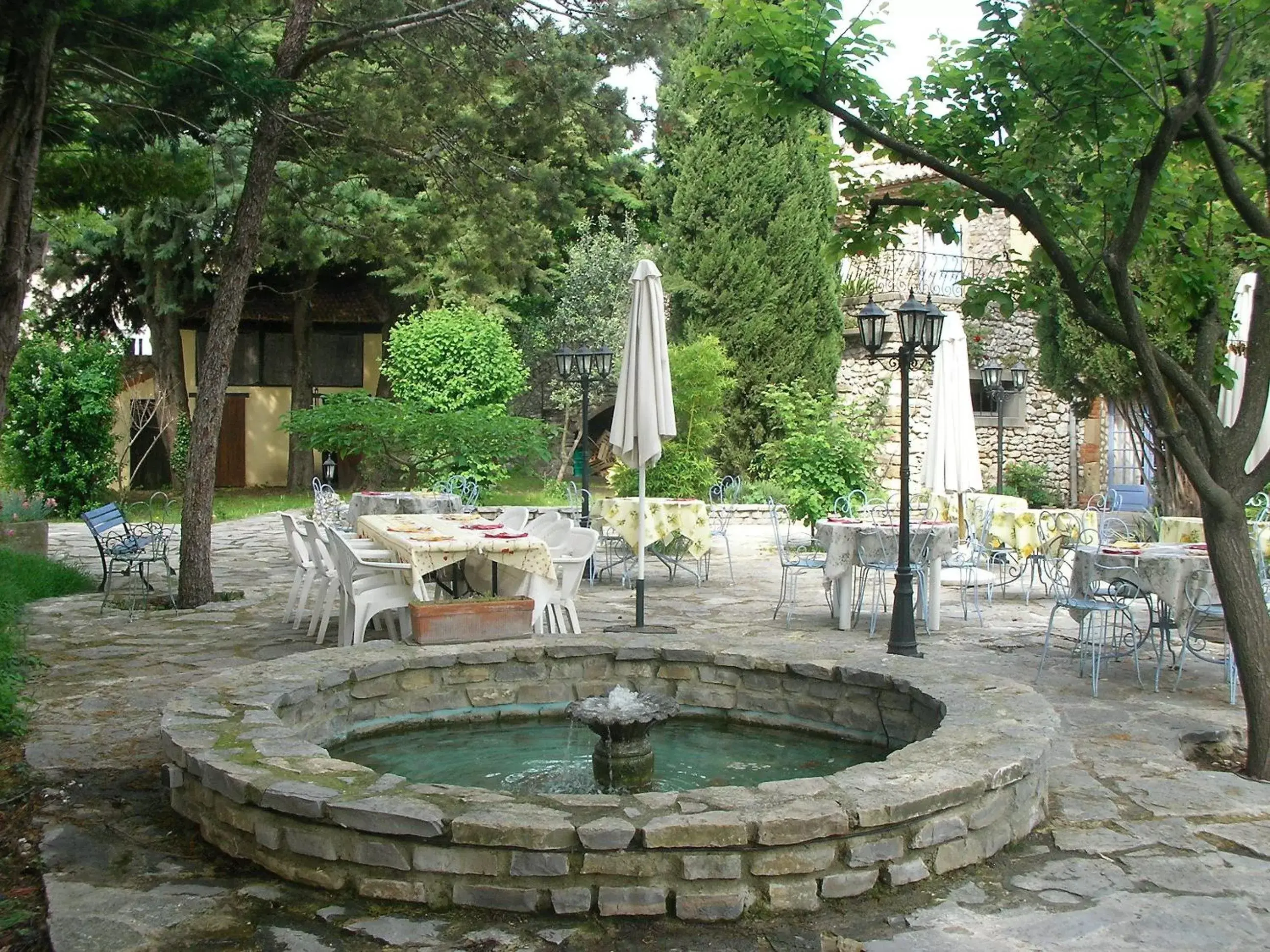 Garden in Logis Hotel Restaurant L'Esquielle