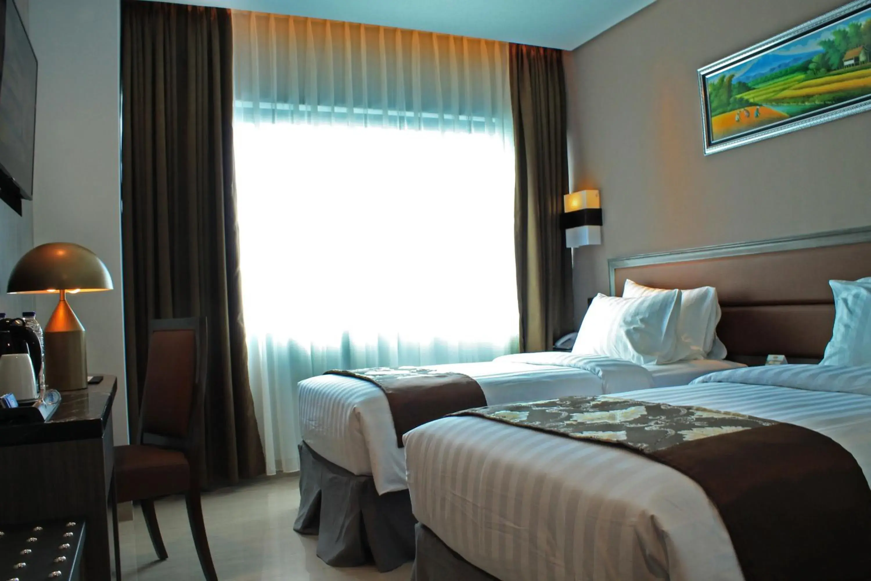 Bed in Arthama Hotels Losari Makassar