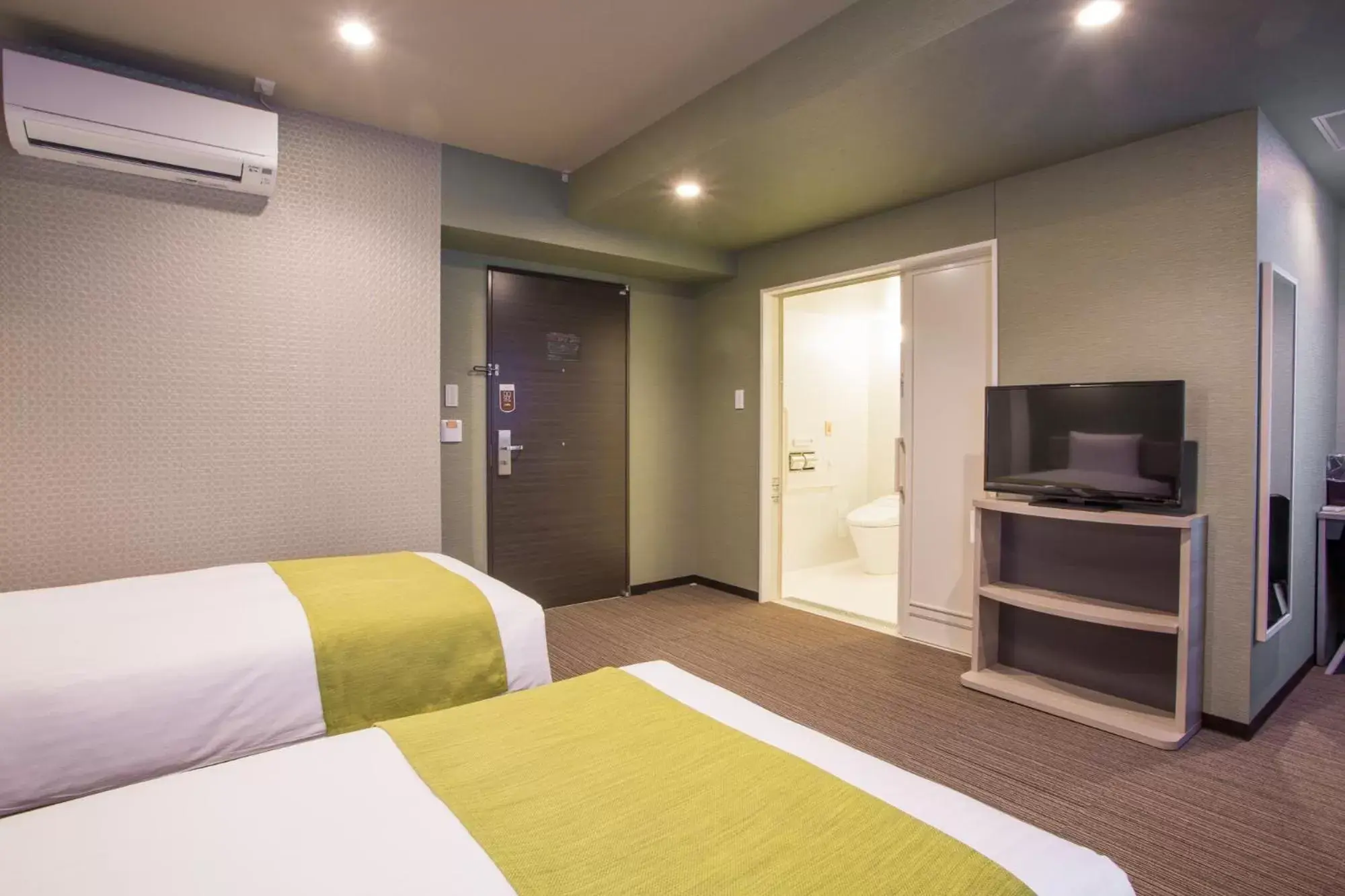 Bed in Kuretake Inn Nagoya Hisayaodori Bed in Kuretake Inn Nagoya Hisayaodori