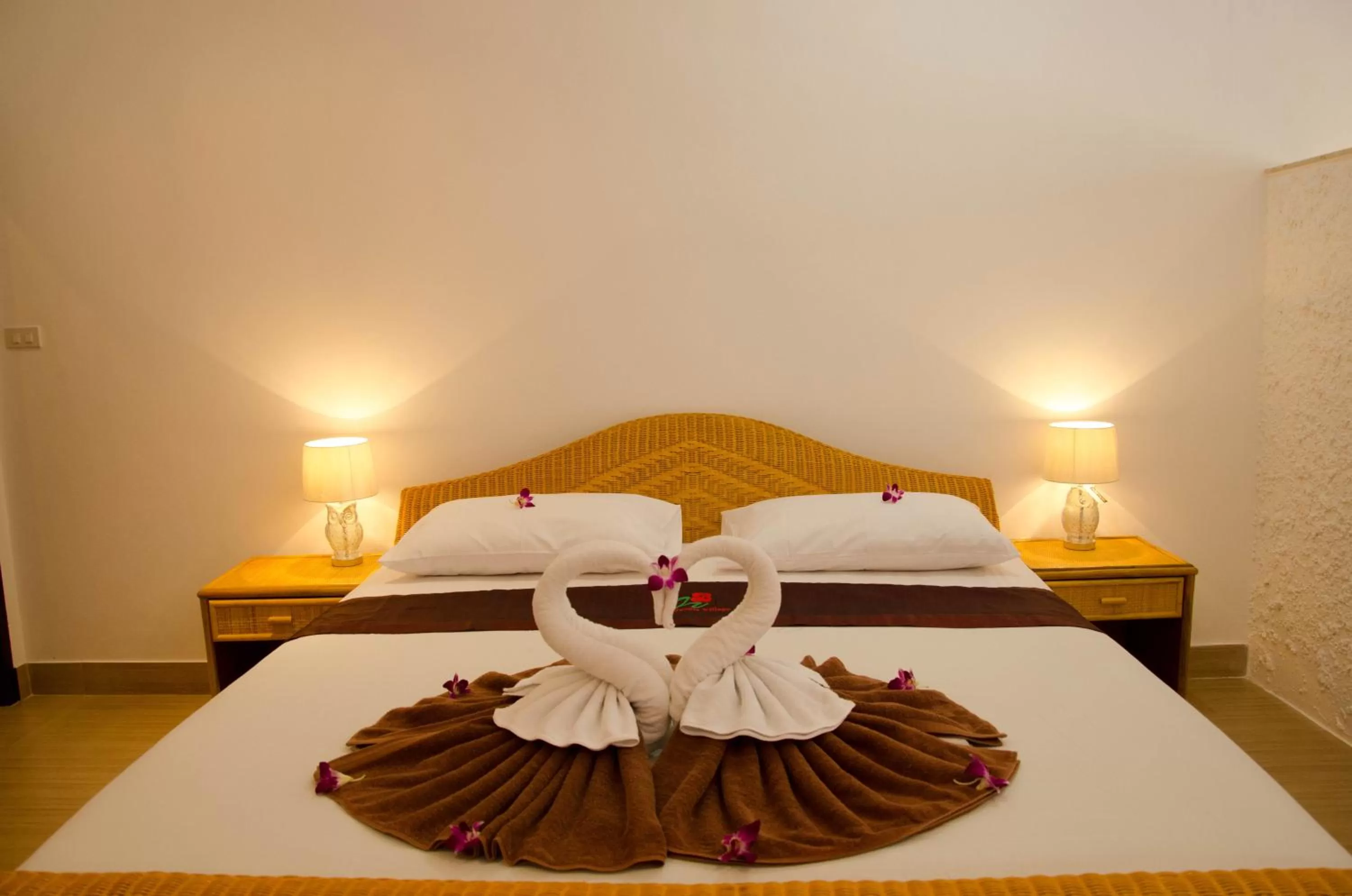 Bed in Jungle Village Bungalow