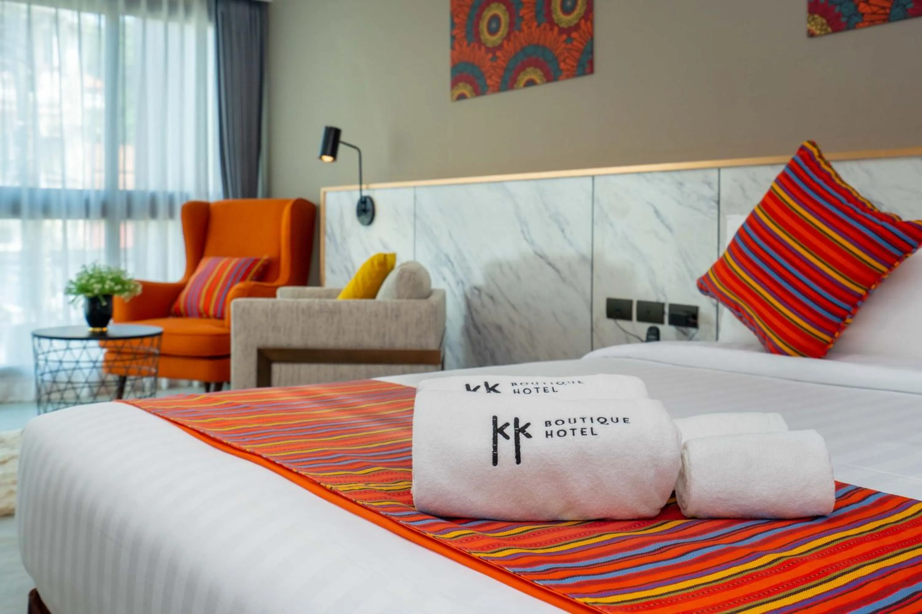 Bed in KK Karon Kata Boutique Hotel