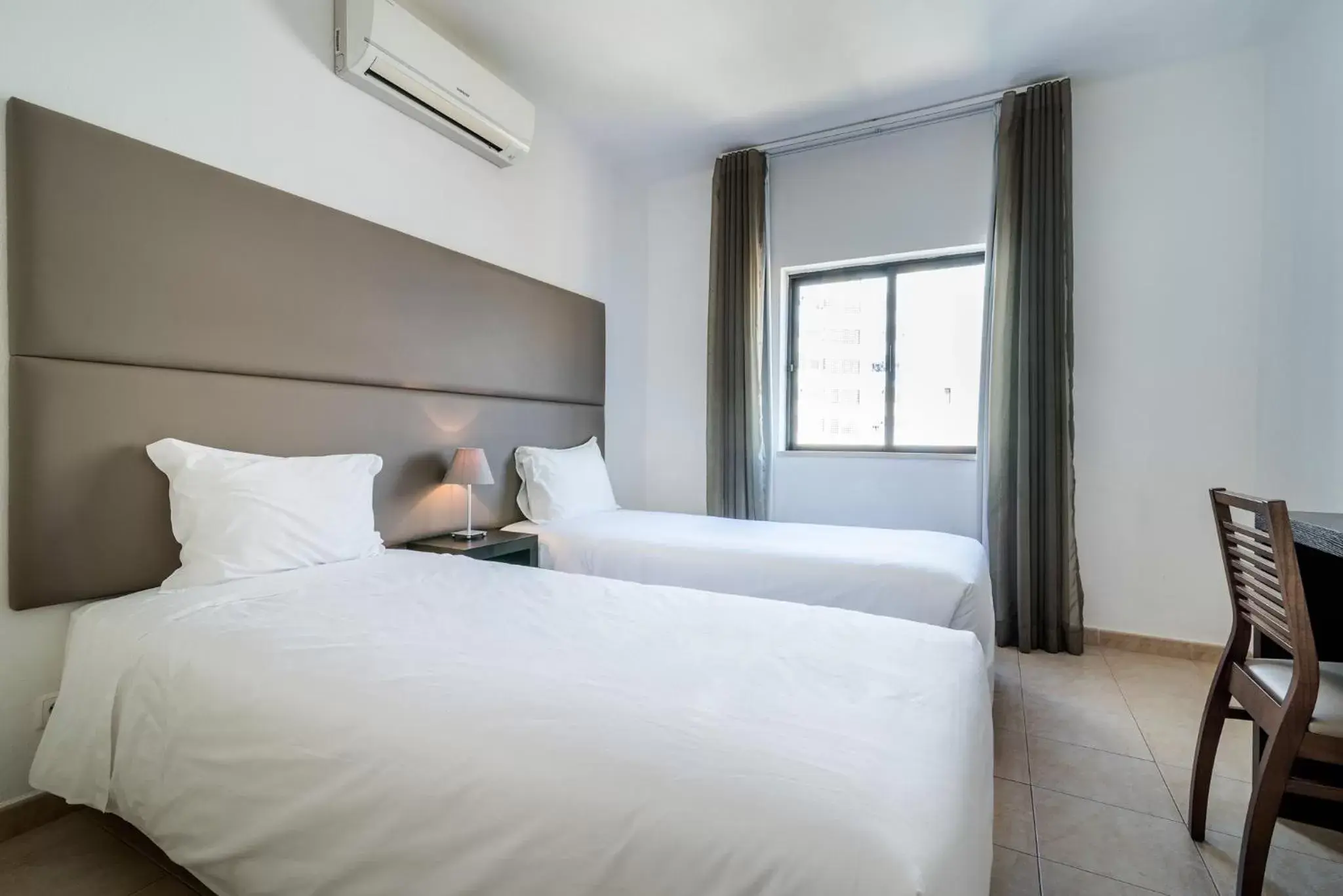 Bed, Room Photo in Clube Vilarosa
